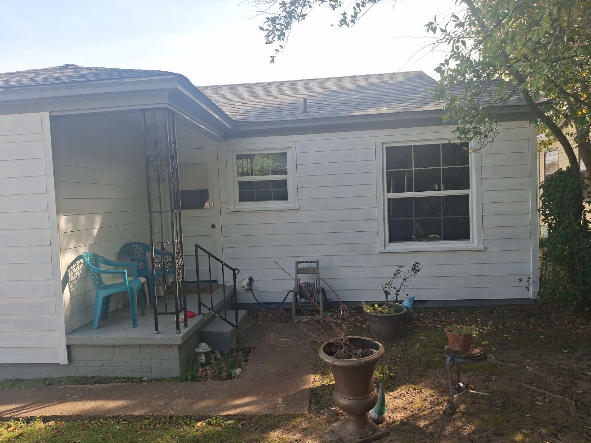 A Fresh Start for a Tiny Tyler, Texas Home by Quality Coats Painting