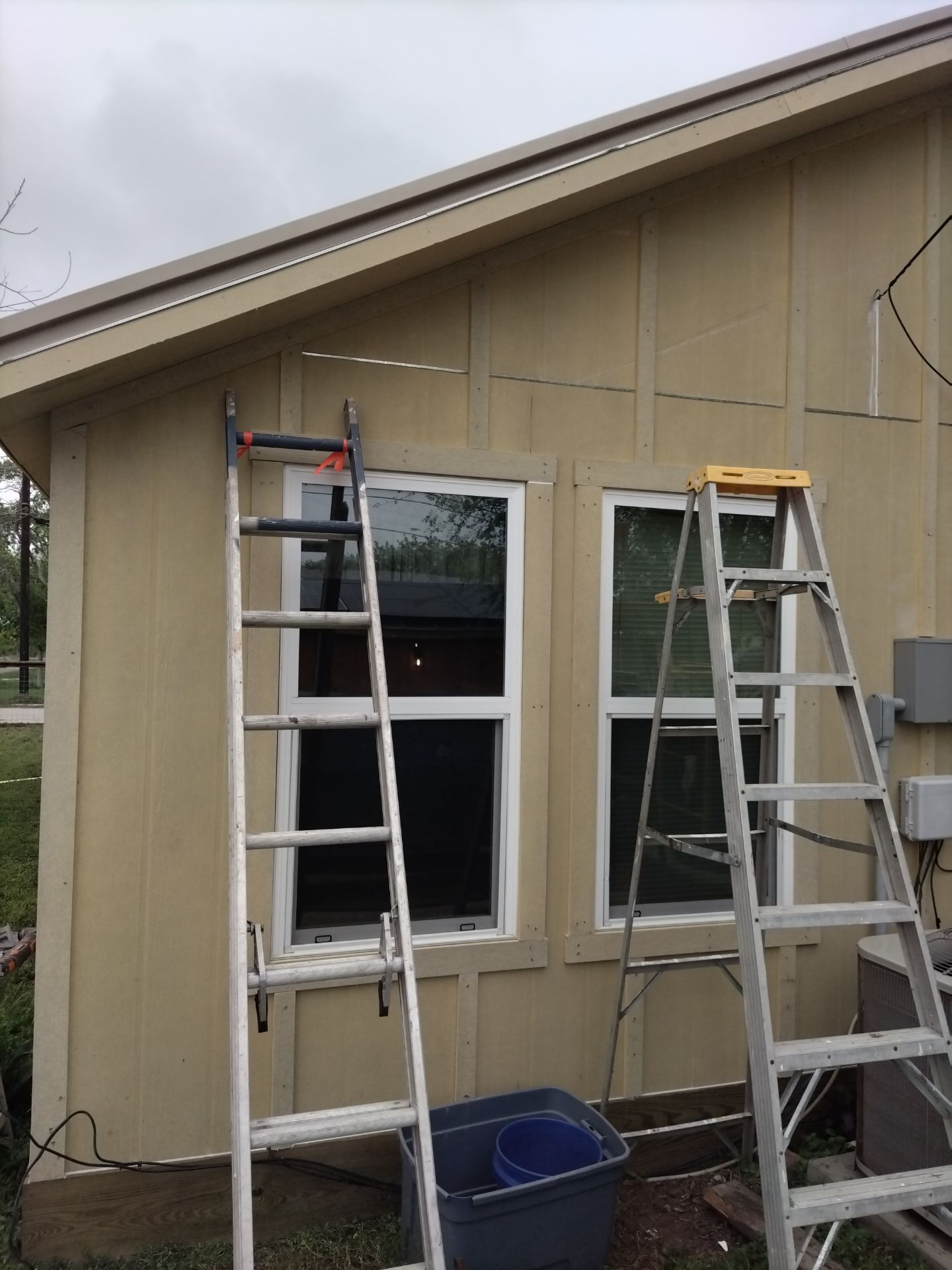 Vinyl to Hardie by Bayfront Roofing and Construction