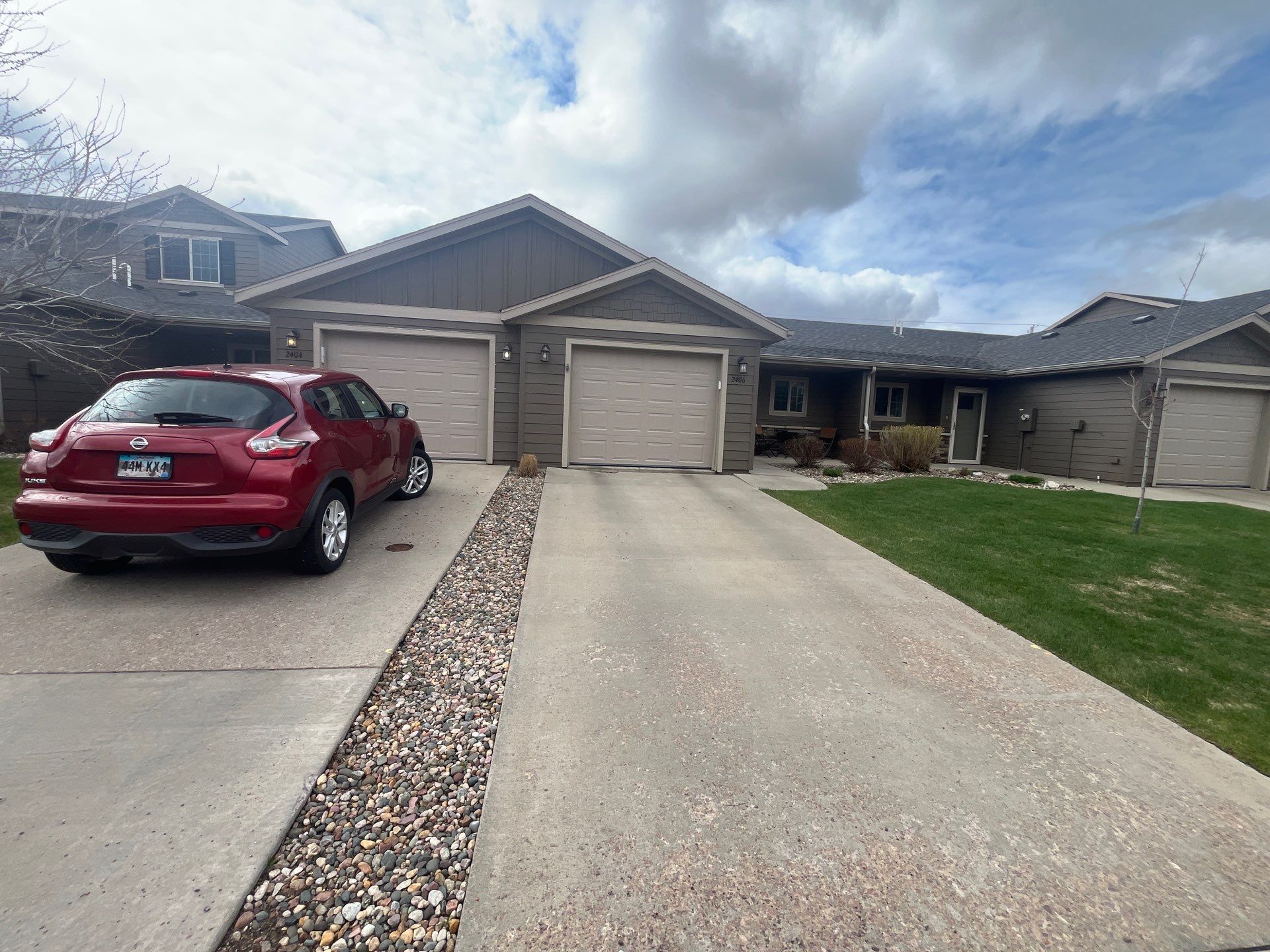 Exterior Painting for Multi-Unit Townhomes in Sioux Falls by Select Painting, Coatings & Garage Cabinets
