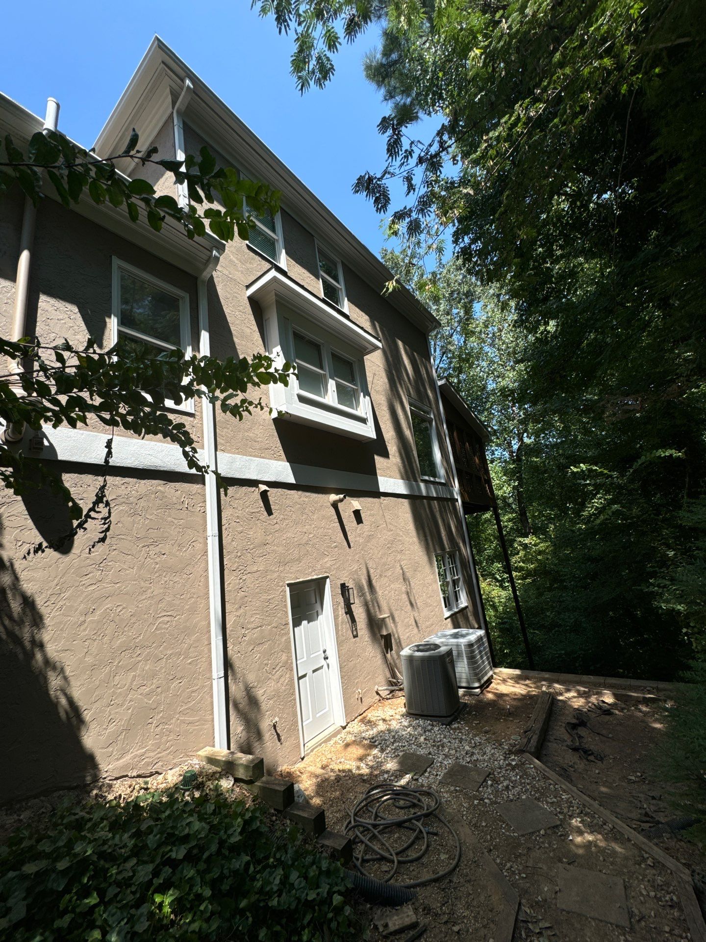 Atlanta Exterior Refresh Featuring Wood Privacy Fence and Door Painting by Swift Home Renovations