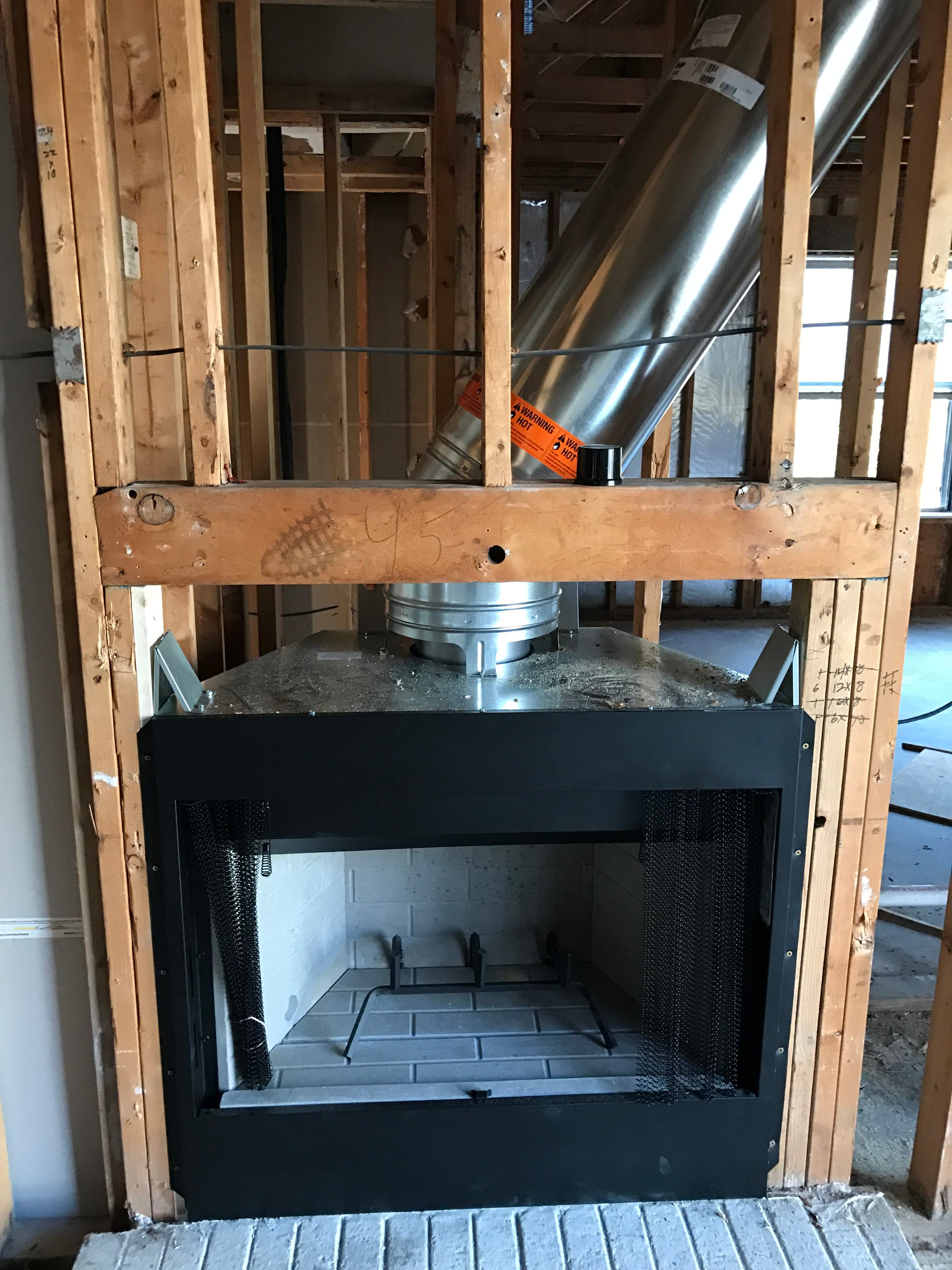 Apartment Fire Rebuild x2 Fireplaces by Premier Chimney and Roofing