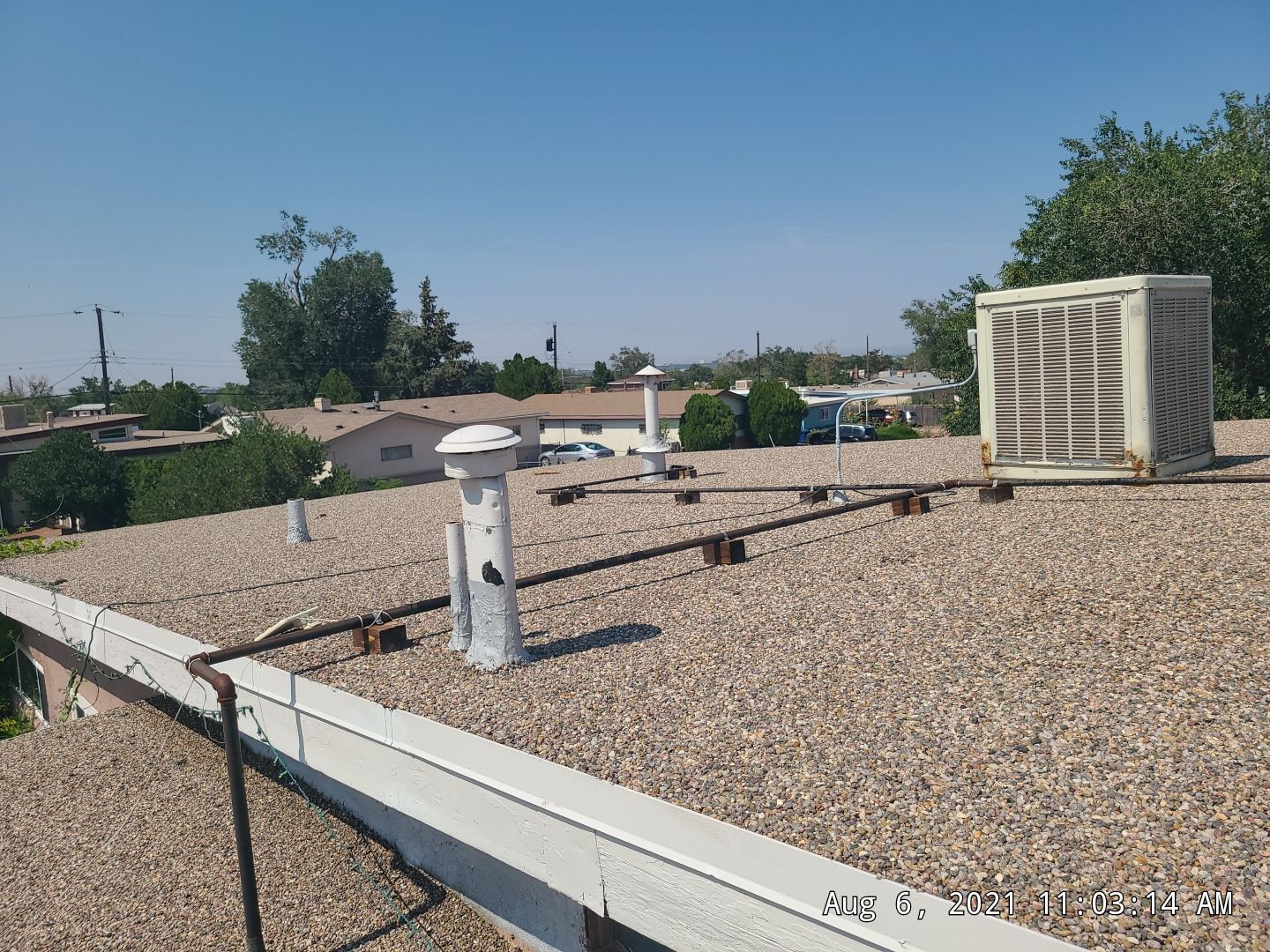 Residential TPO Roof Replacement and skylight replacement in Albuquerque by Doyle Roof Masters Inc