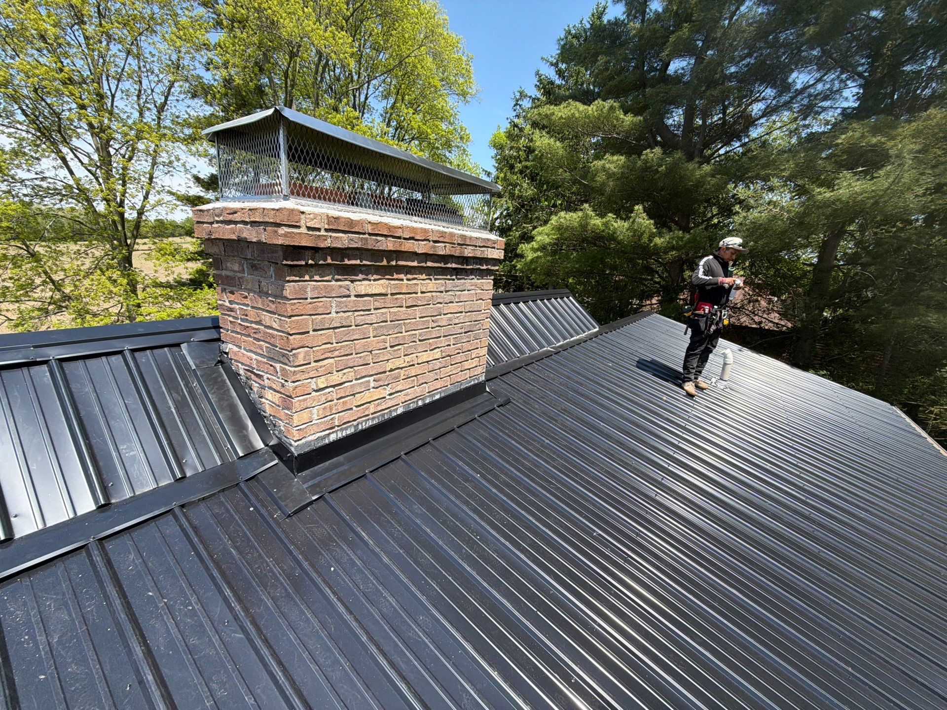 Classic Rib Metal Roofing - Shiny Black by Hoel Roofing & Remodeling