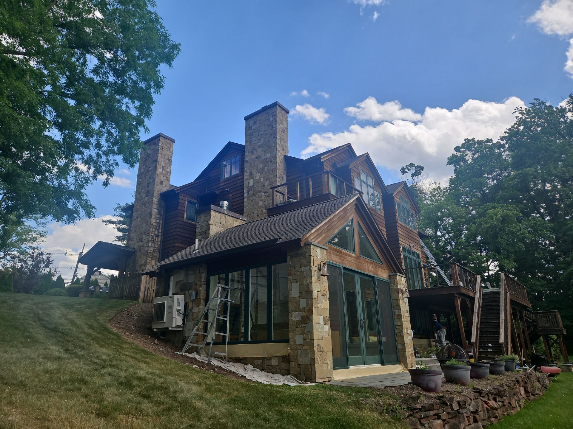 Exterior Powerwashing and Maintenance for a Teaneck Timber Home by Spectrum Painting, LLC
