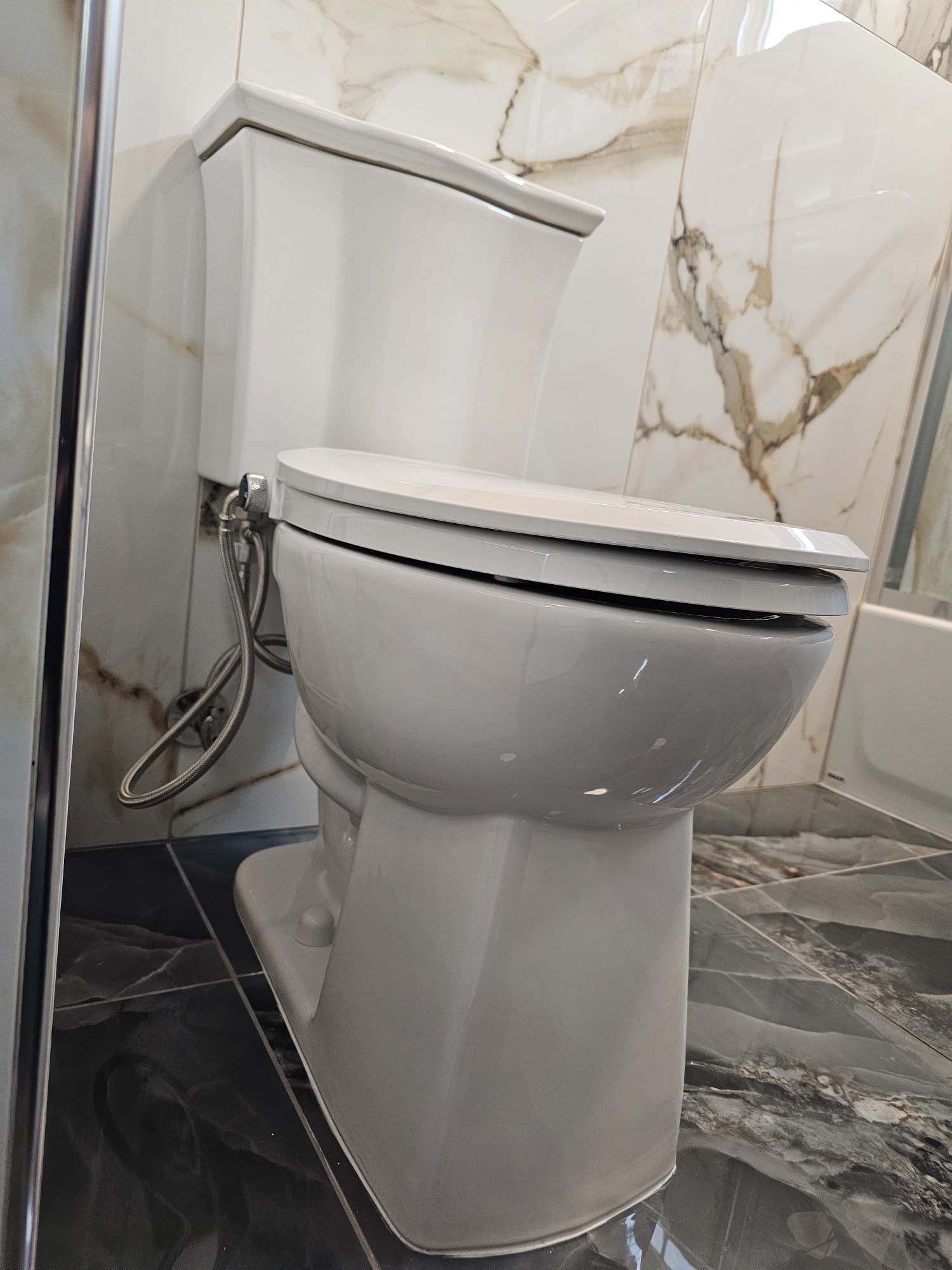 Luxury Bathroom  by Blue Handyman   LLC