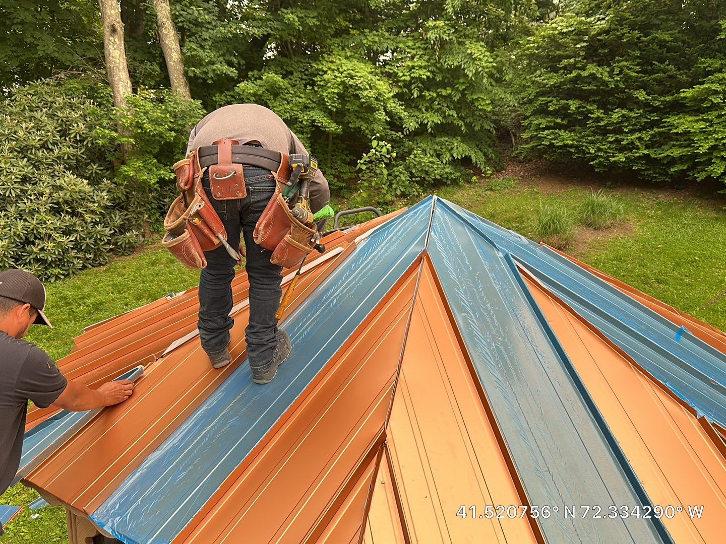 Residential Roofing Installation using Copper Penny Metal Roof by A Plus Exterior