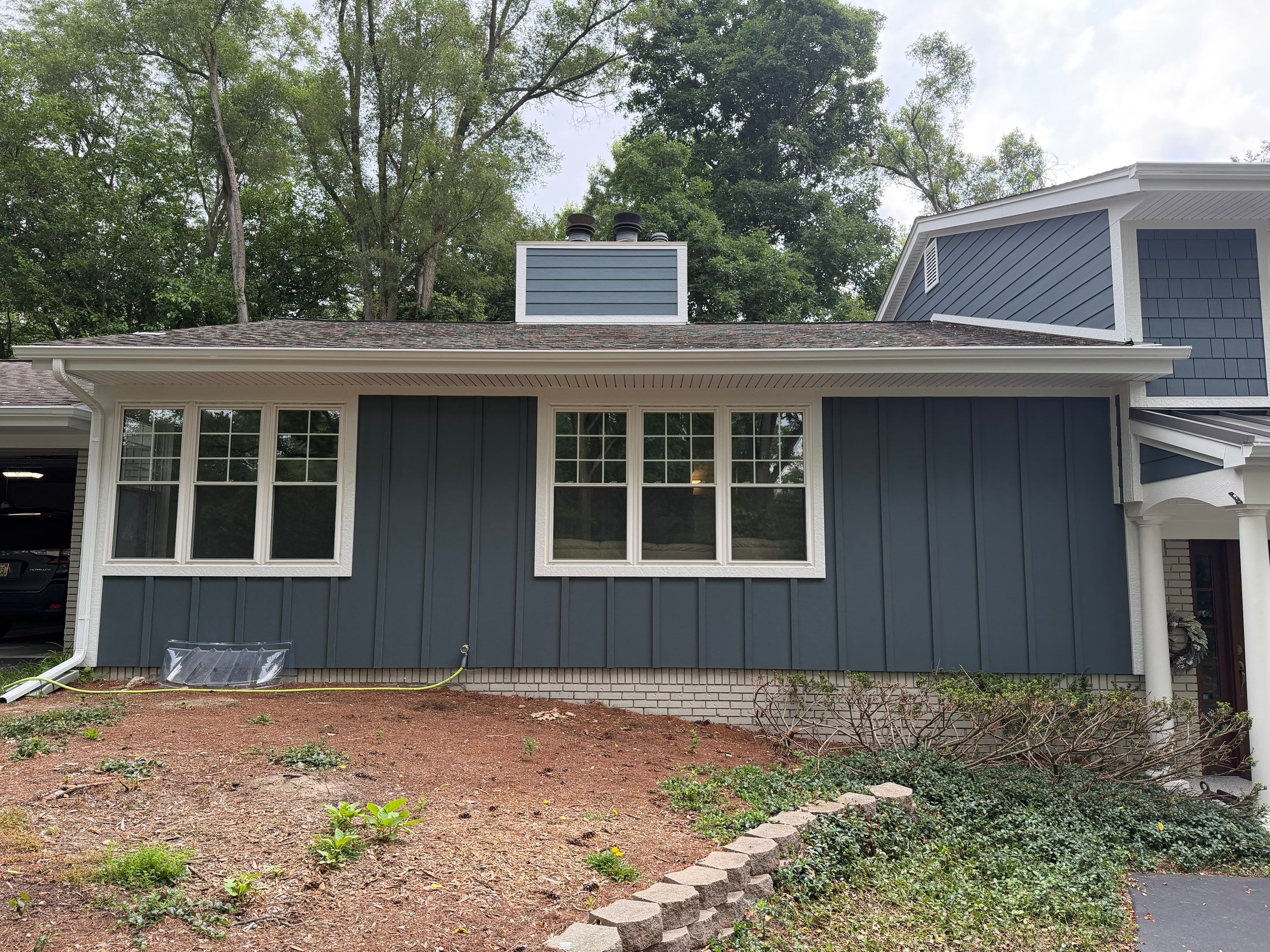 James Hardie Siding Replacement & Metal Roof by Bloomfield Construction & Restoration