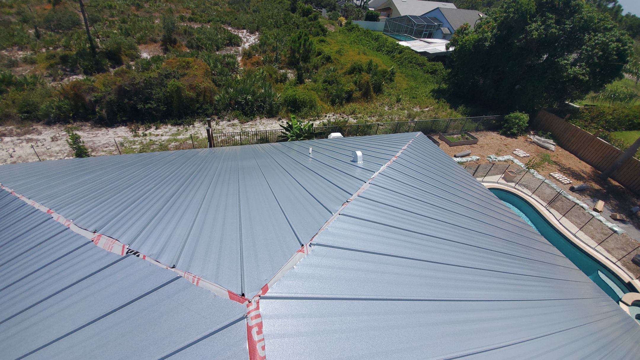 Standing Seam Metal Roof Replacement by Sailfish Roofing