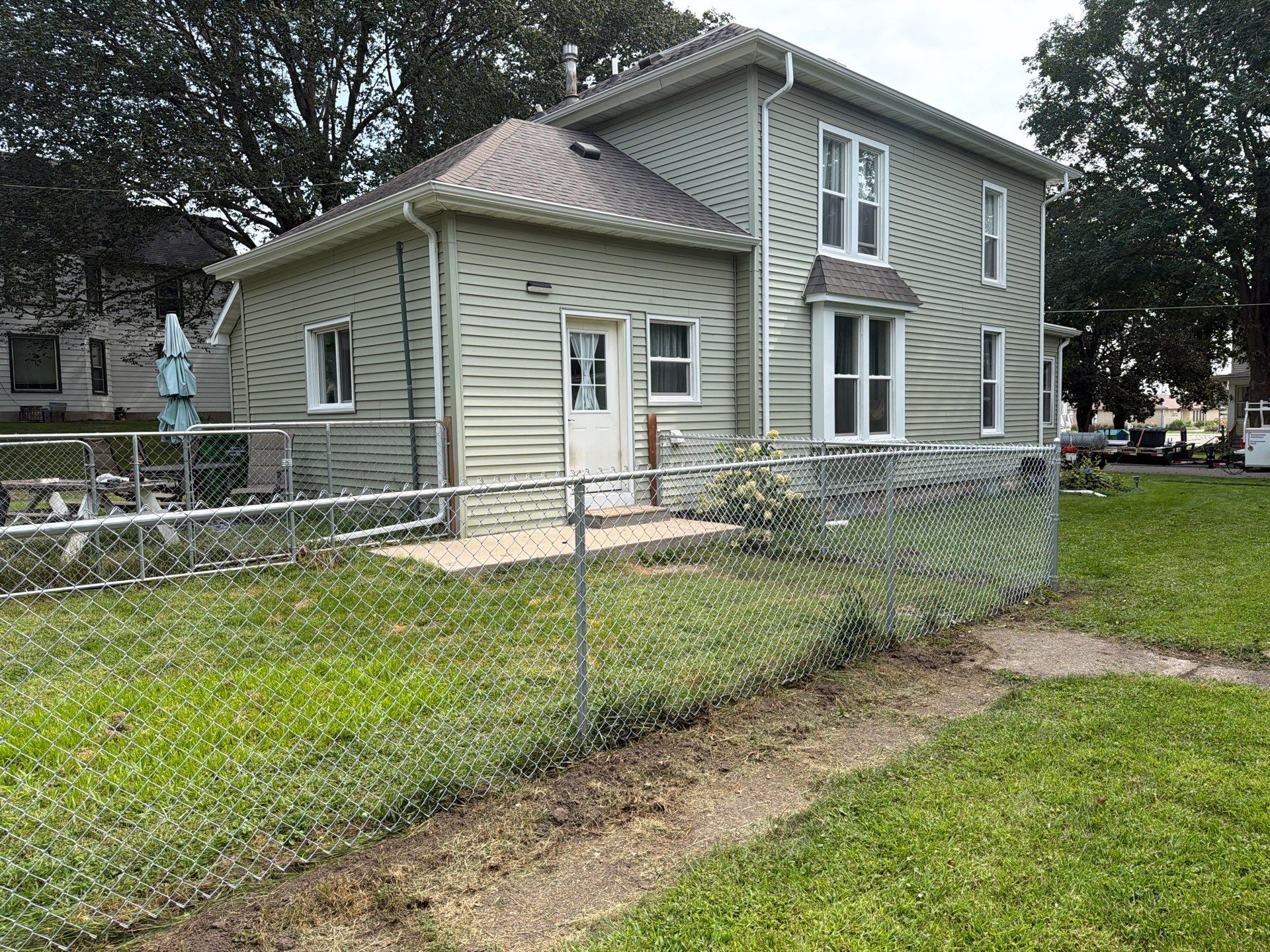 Galvanized Chain Link Fence and Gate Installation in La Porte City by Perfect Picket Fence and Stain
