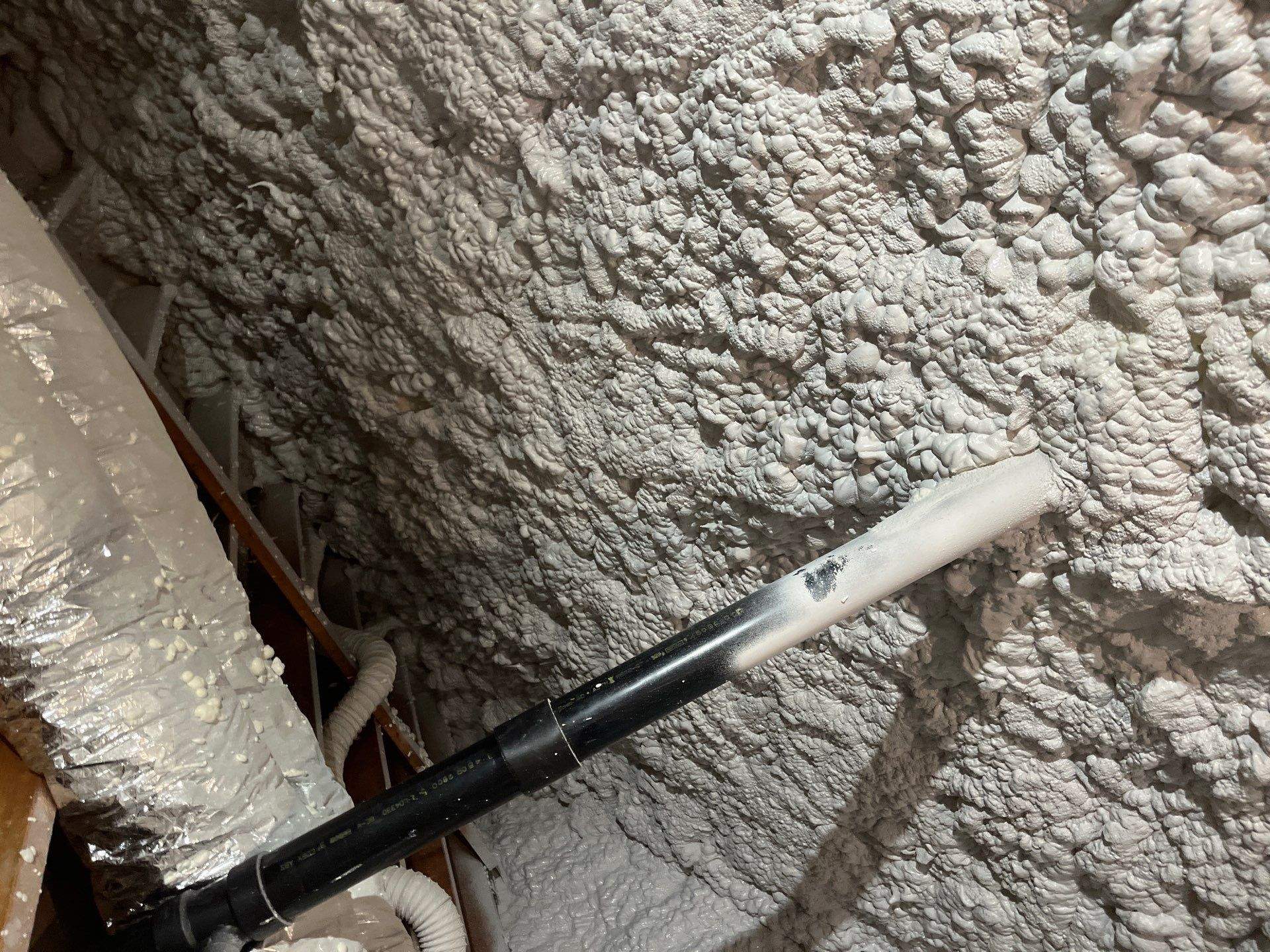 Attic Insulation using open cell spray foam by NYS Foam & Energy