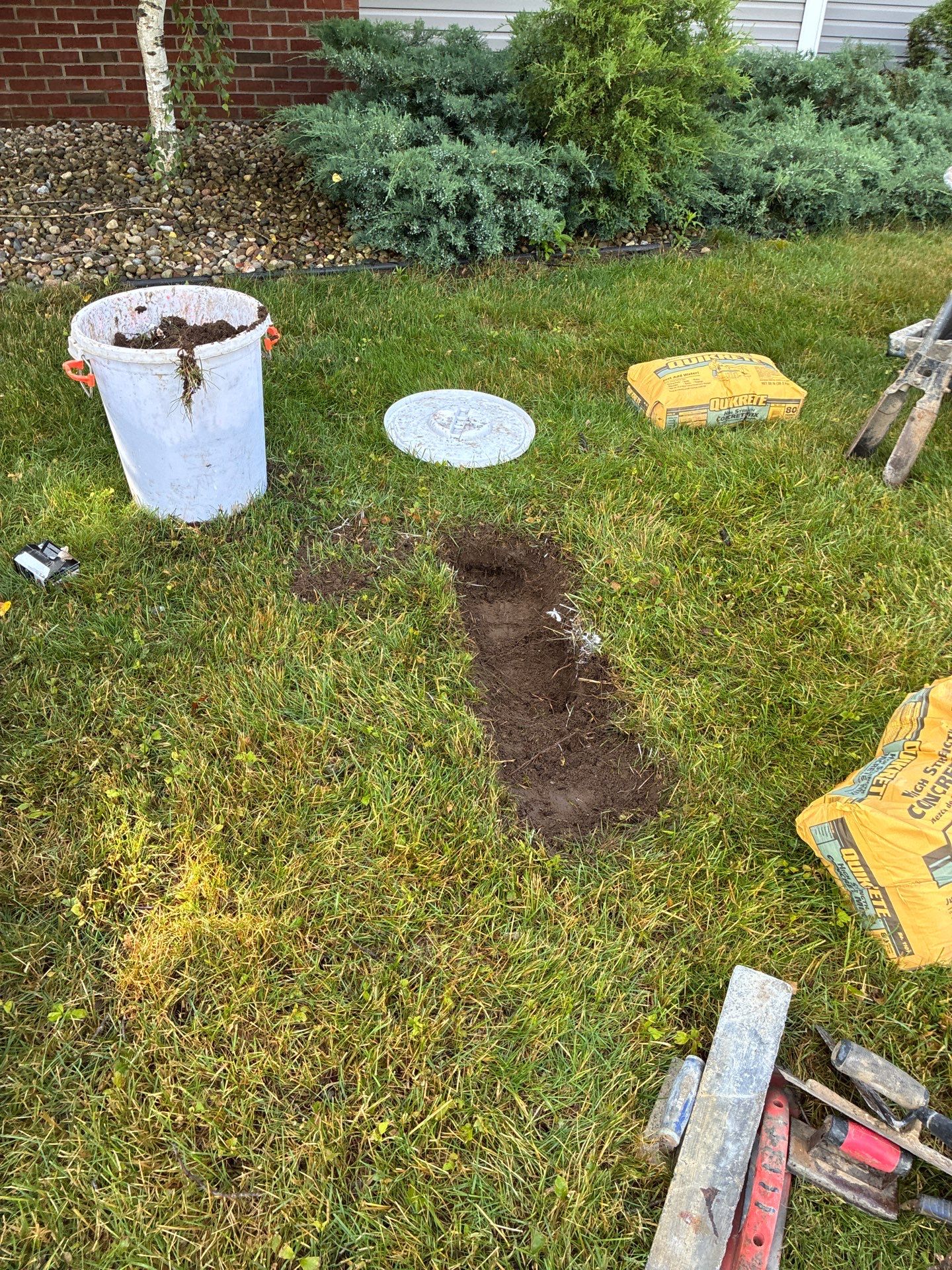 Custom Monument Signage and Concrete Foundation Installation in Granger by Hayes Design co