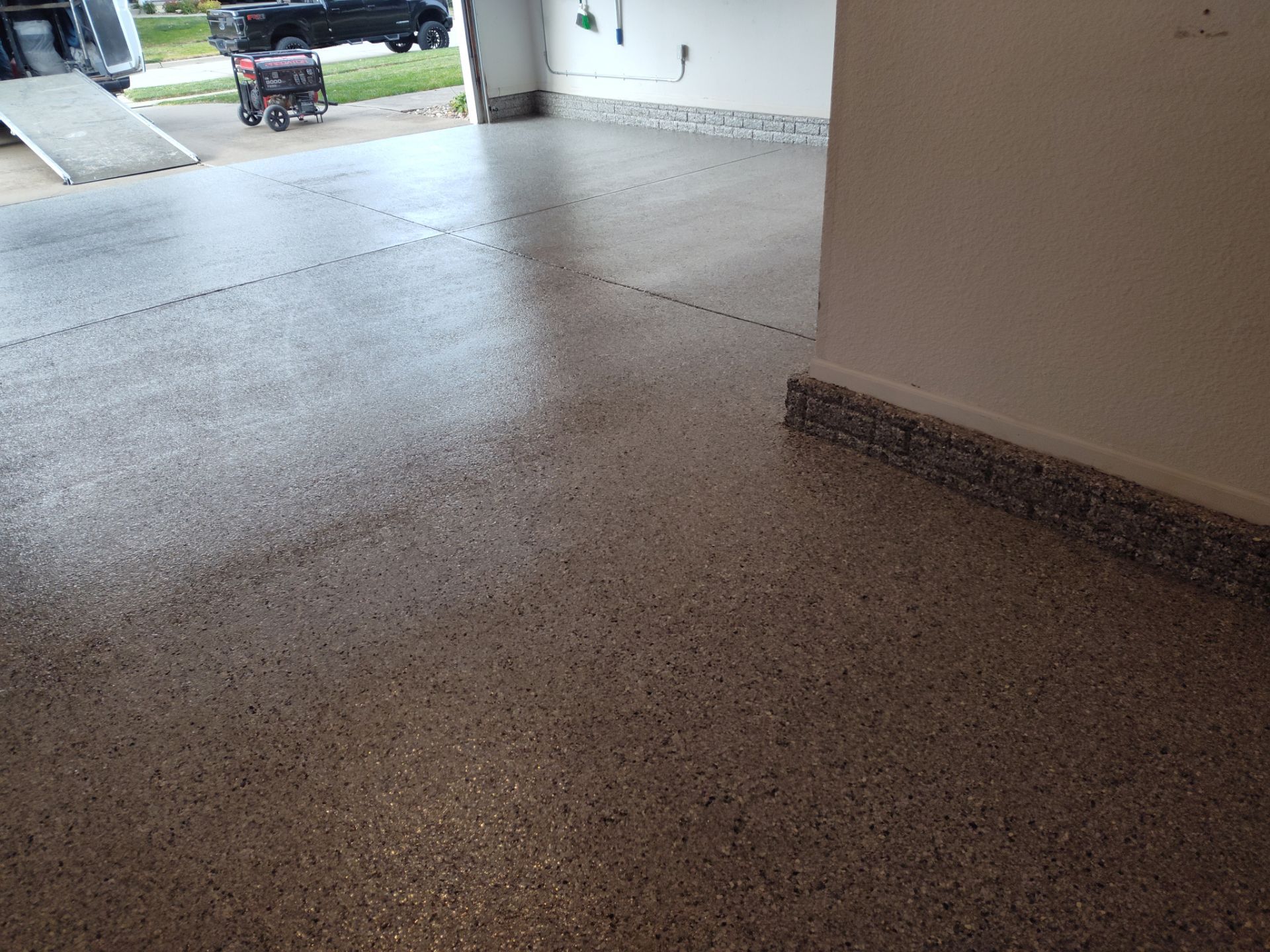 A Garage In One Day Keeps the Rock Salt Away! by Revival Concrete Coatings