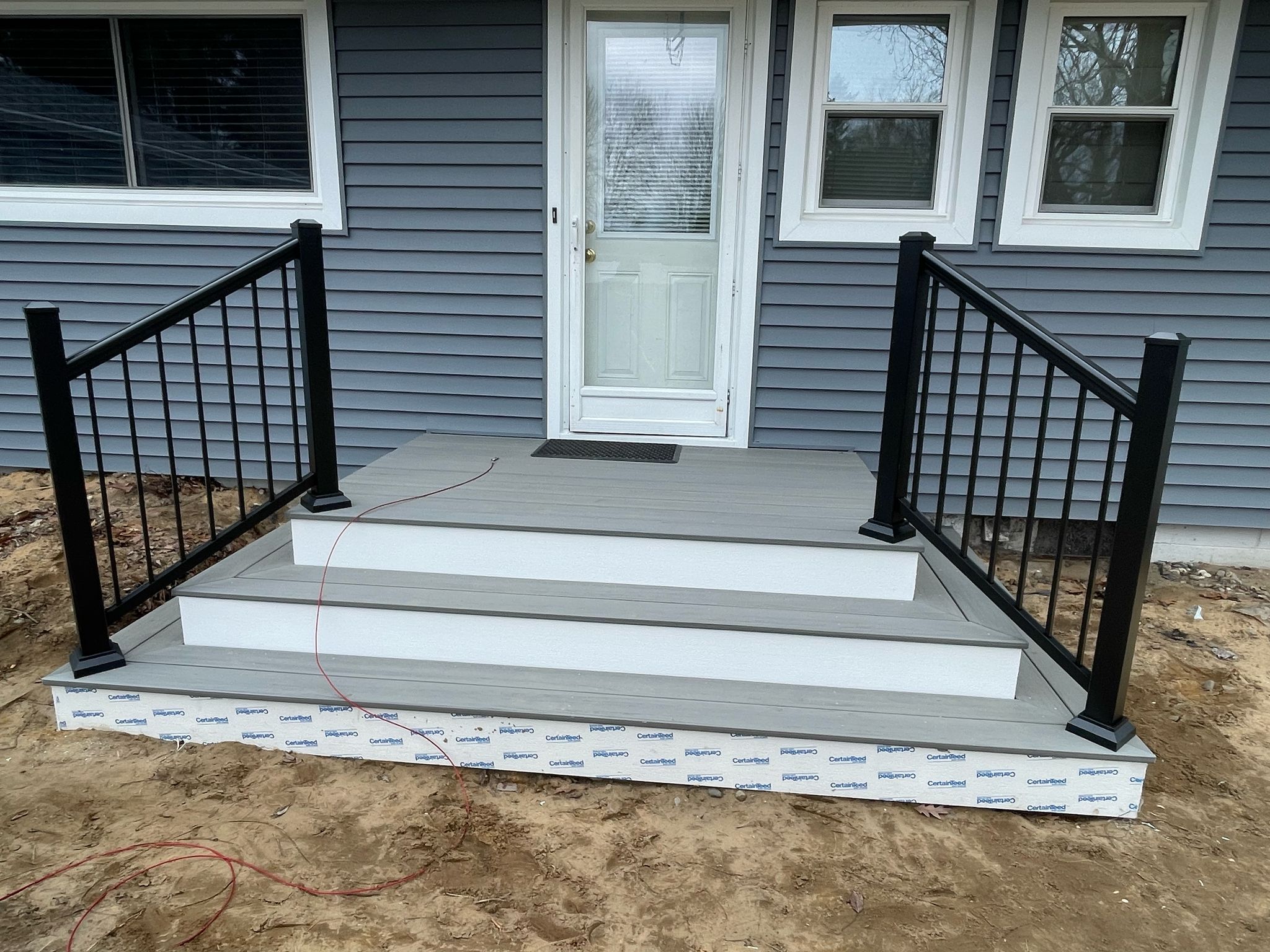 Siding, Front and Back Porch  by Avalon Roofing and Exteriors