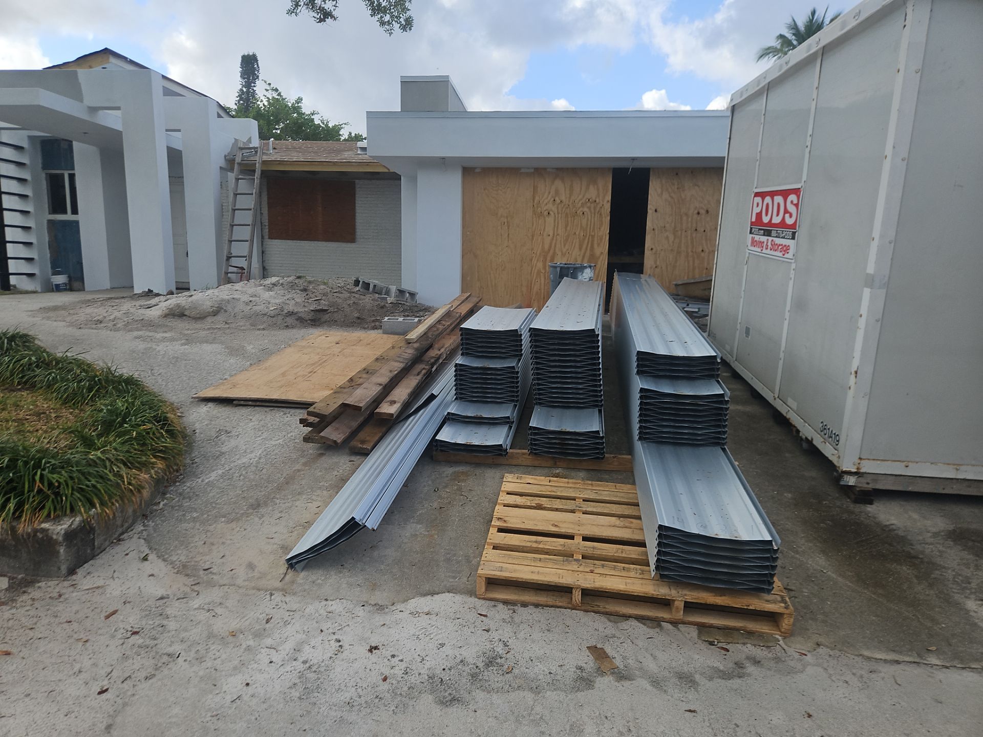 Residential Roofing Installation using 1" Nail strip metal roof by BLUES BROTHERS CONSTRUCTION CORP