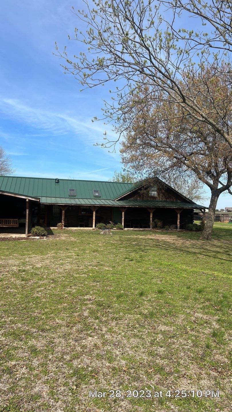Shingle to Standing Seam Metal Roof by Springtree Restoration