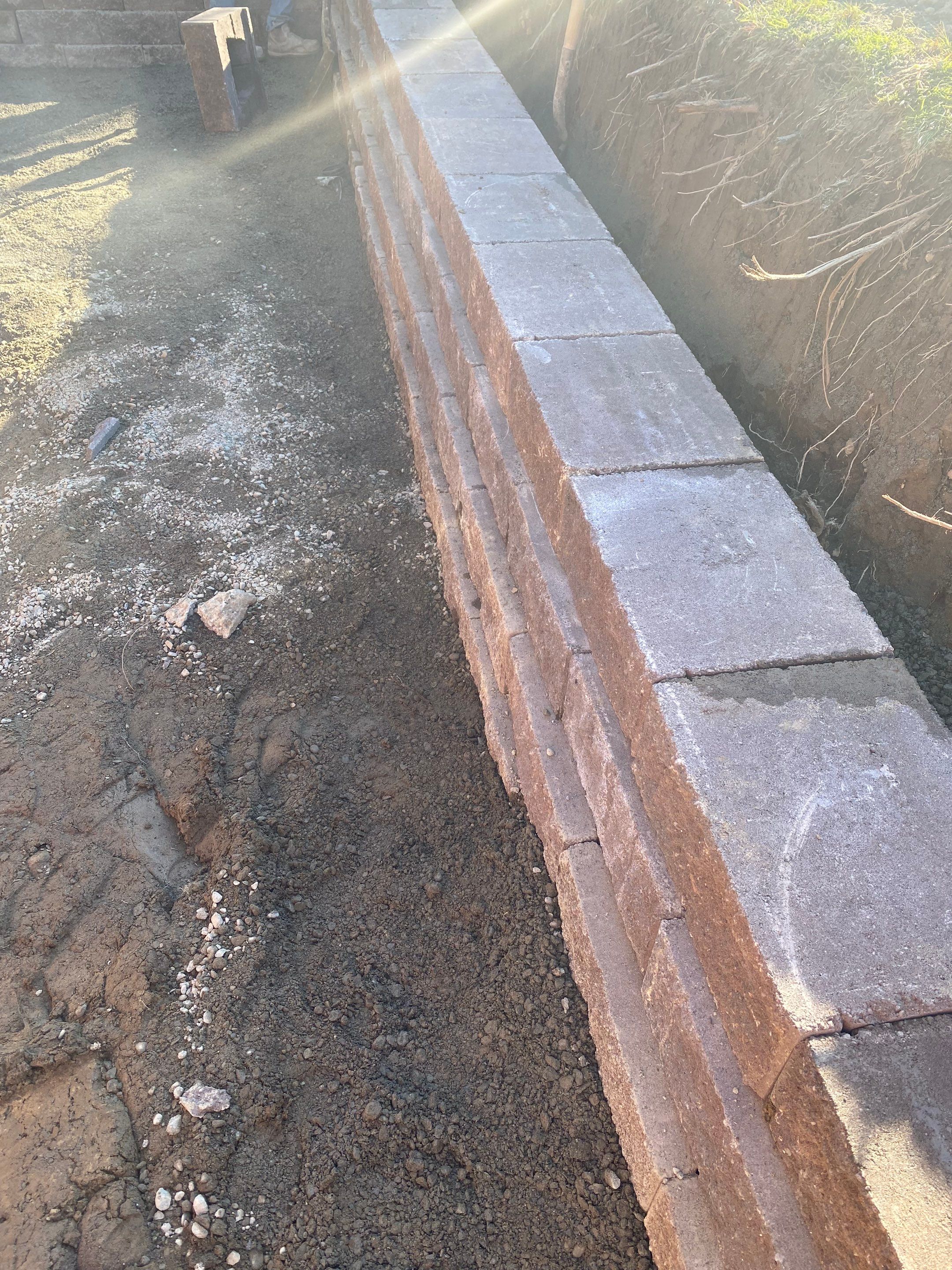 Lorra | Asphalt Driveway Repair & Retaining Wall by Jireh Asphalt & Concrete Inc 