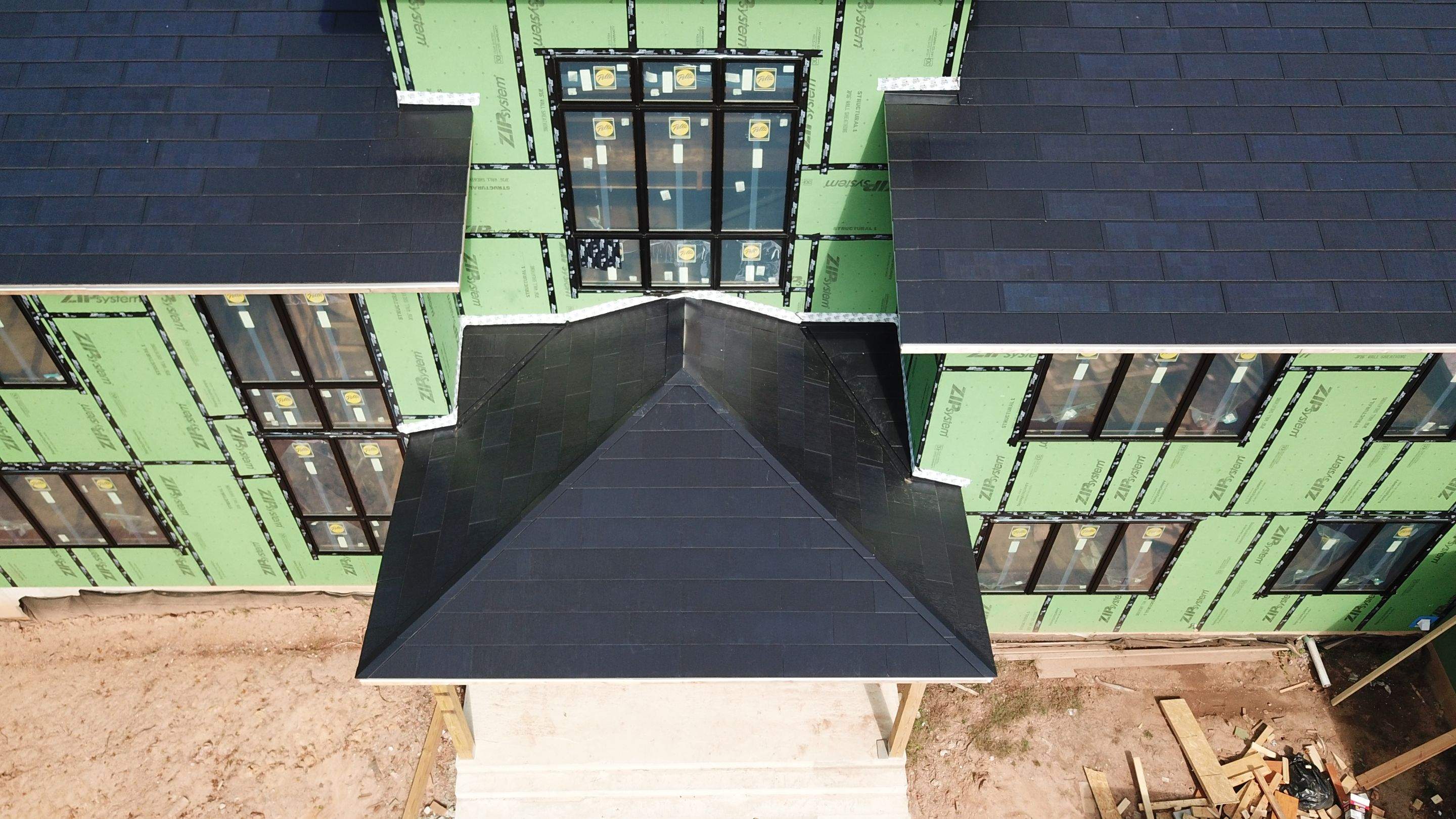 Tesla Solar Roof  using Tesla Solar Roof V3 tiles by American Home Contractors