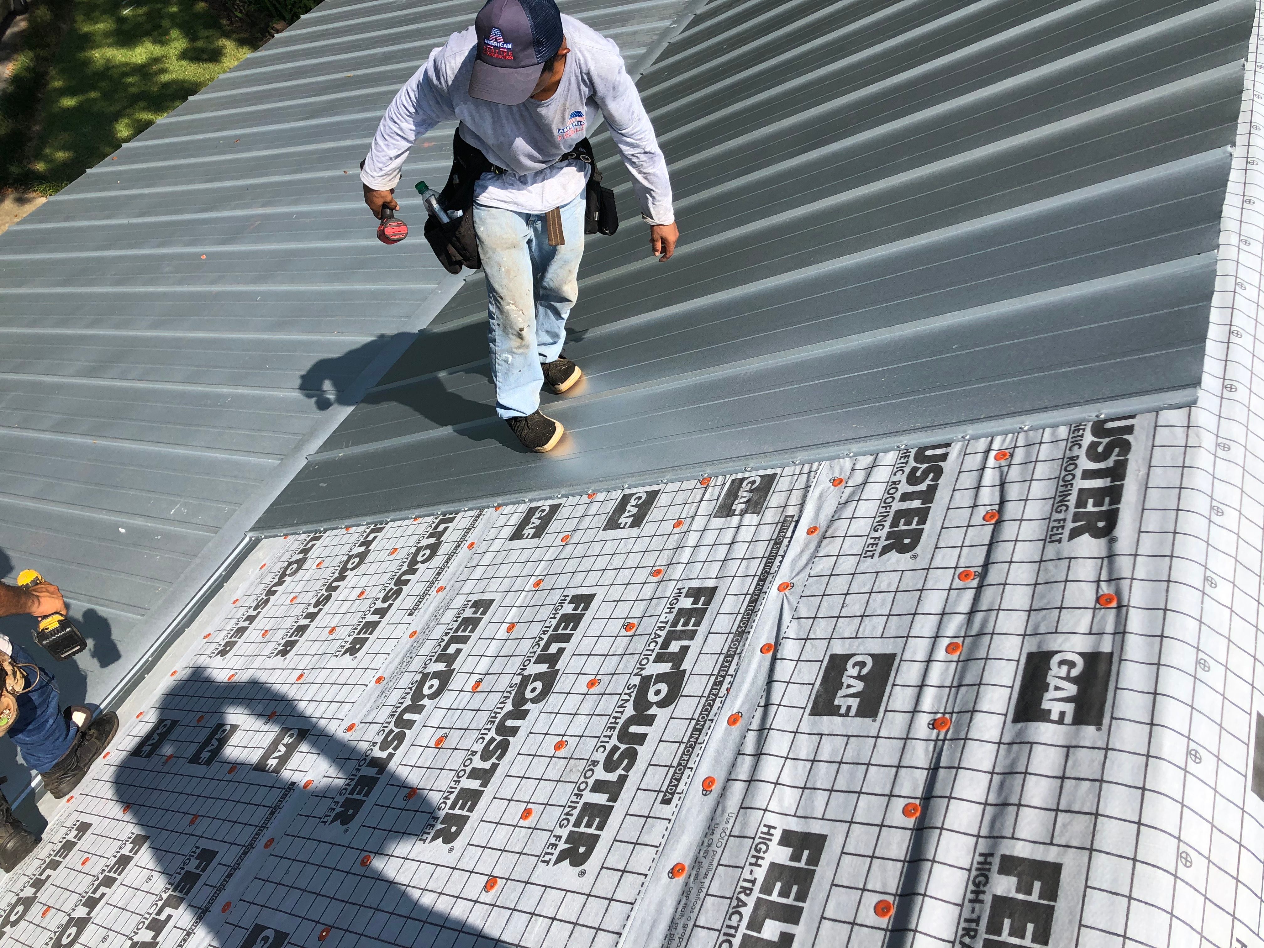 Residential Roofing Installation using Metal roofing by American Roofing & Construction LLC