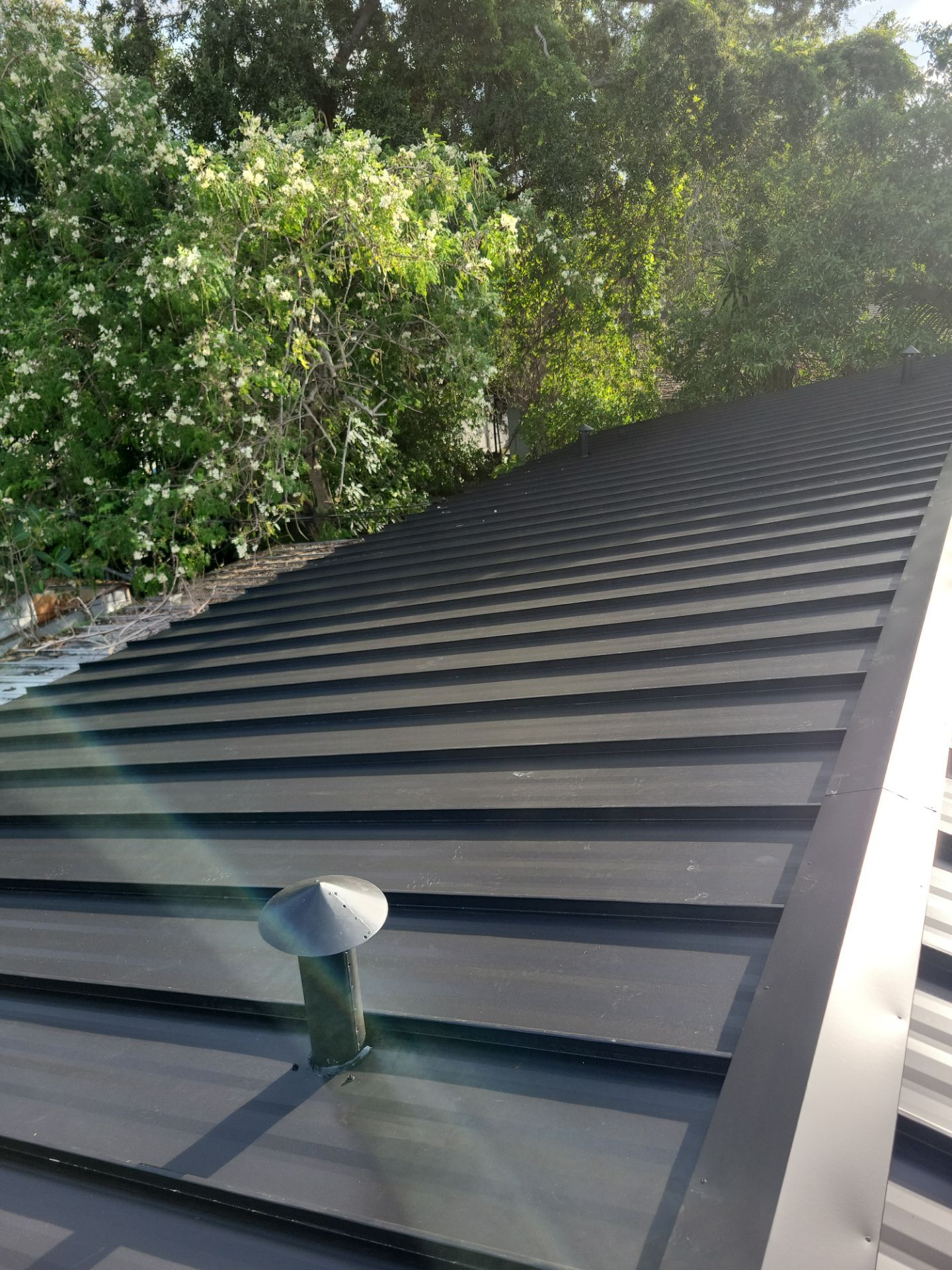 Metal Roof - Matte Black Color. Metal Alliance. by Art's Roofing & Construction