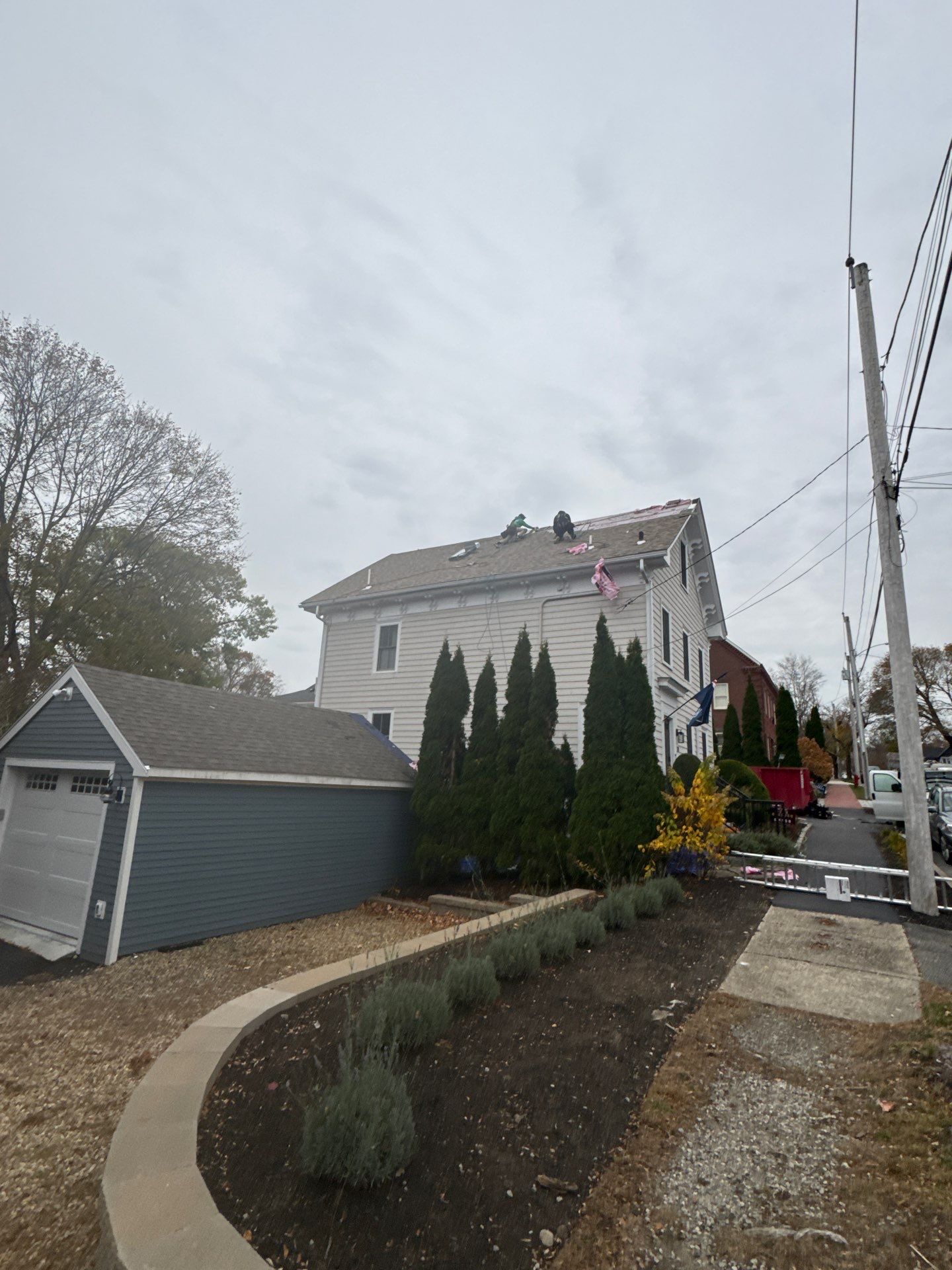 Newburyport Complete Roof Replacement with Solar Venting Skylight by Mighty Dog Roofing of Greater Middlesex County