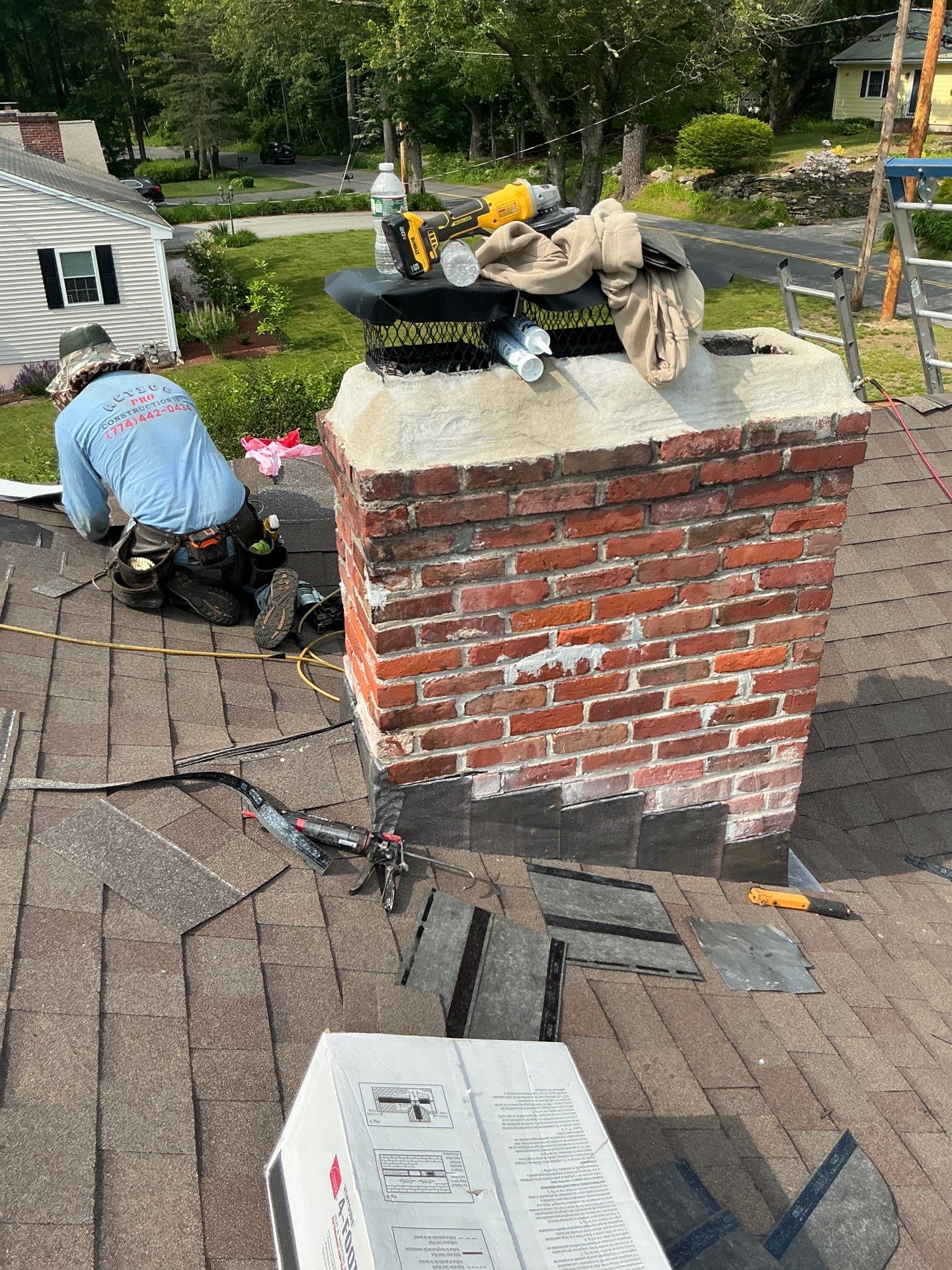 Full Roof Replacement & Chimney Repair – Onyx Black, MA by Mighty Dog Roofing of Greater Middlesex County