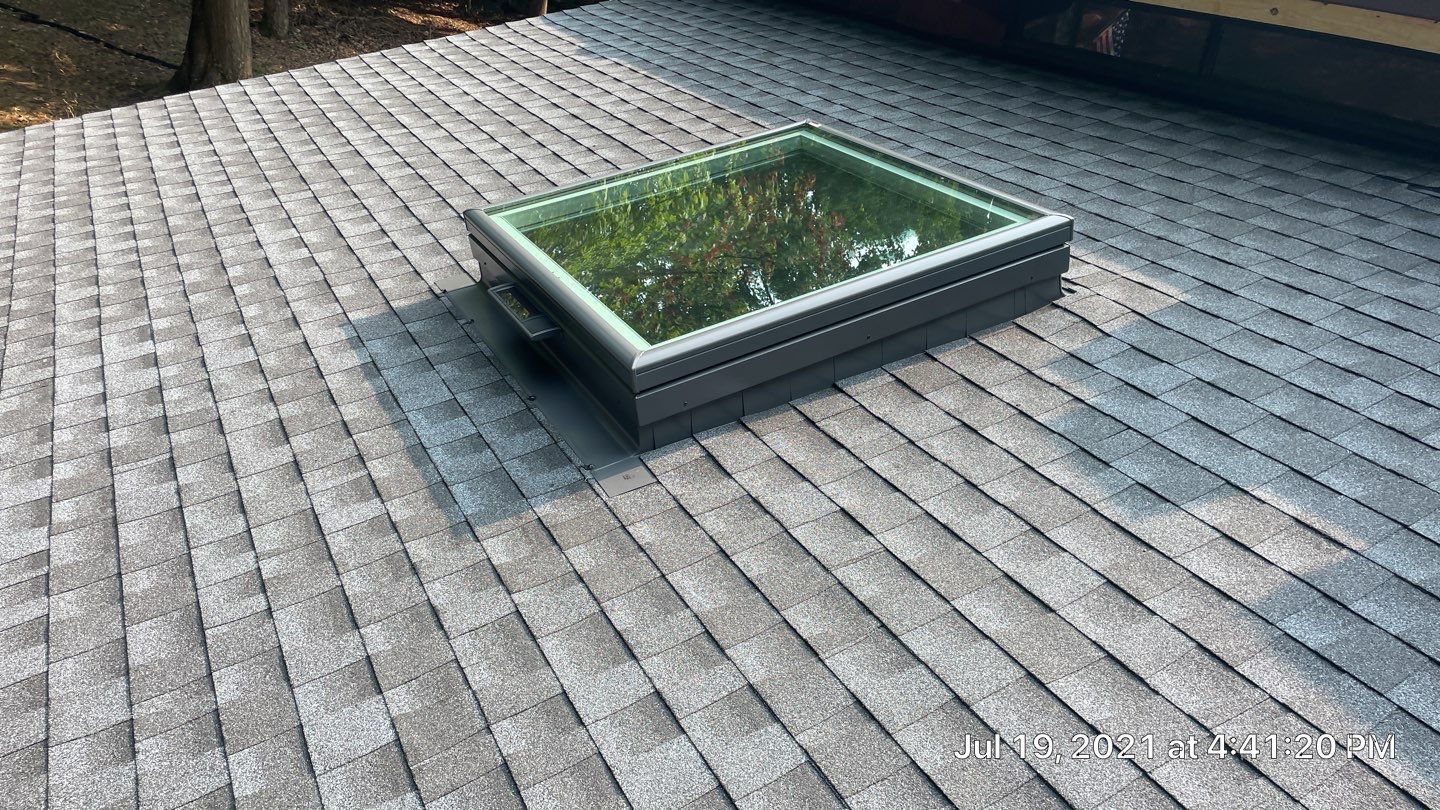 Deckhouse Roof Replacement by American Home Contractors