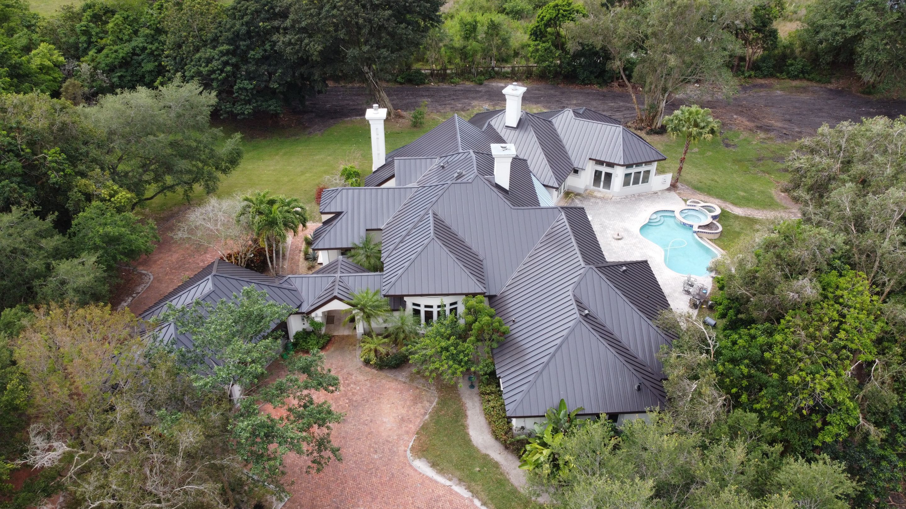 Residential Roofing Installation using 1" Nail strip metal roof by BLUES BROTHERS ROOFING