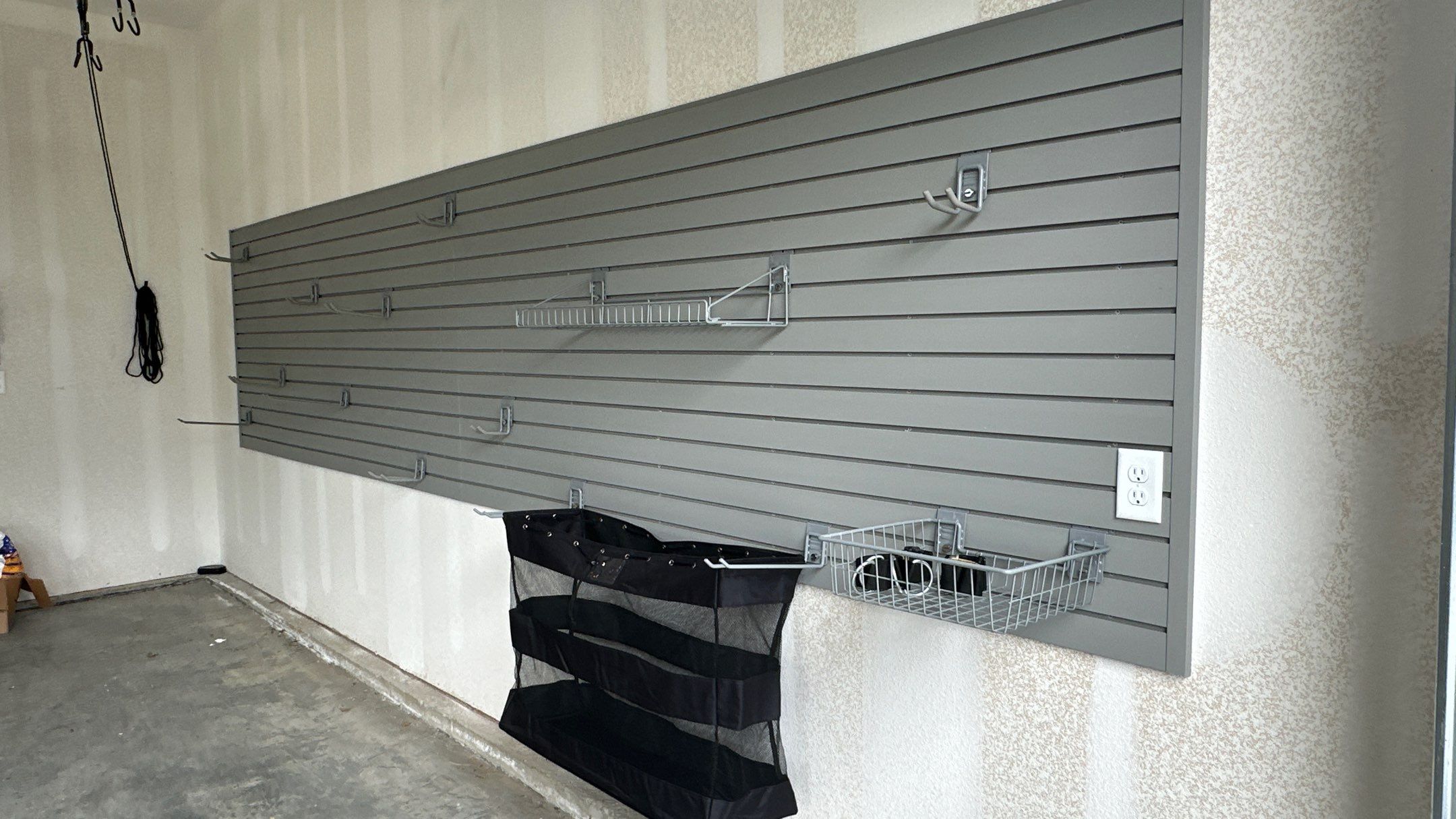 Jim H. added Slotwall and bike hoist to his garage by Banner Garage