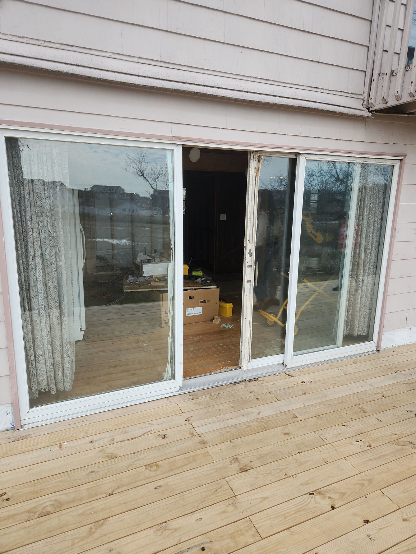 Milford Exterior Renovation Featuring Custom Siding and Wood Deck Installation by A Plus Exterior