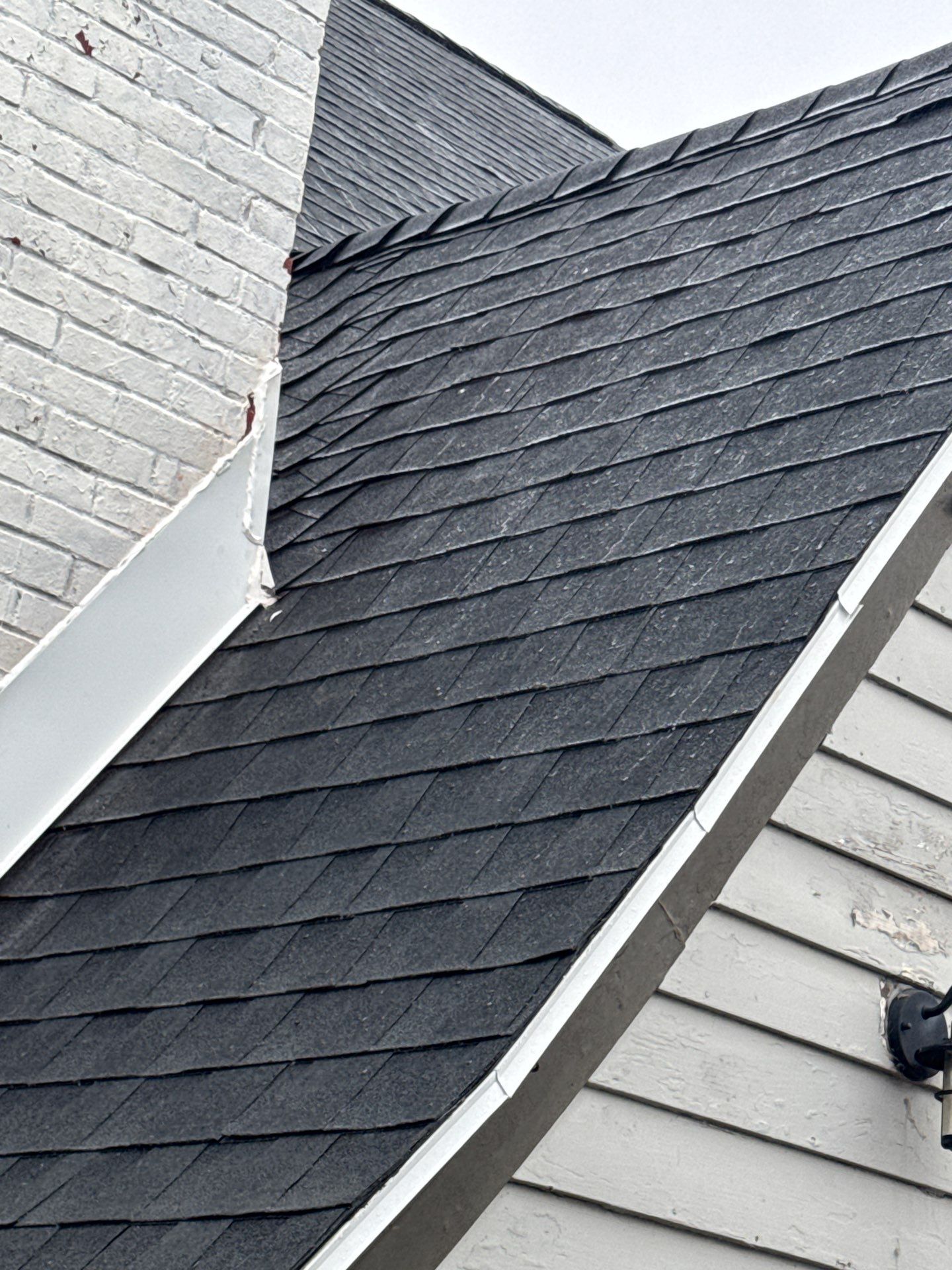 Residential Roofing Installation using GAF Timberline HDZ Charcoal by Rainstoppers Roofing