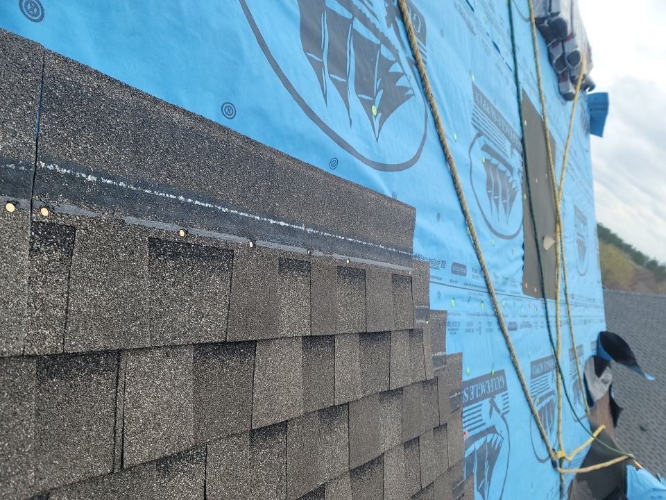 Residential Roofing Installation using Roof Replacement by American Roofing & Construction LLC
