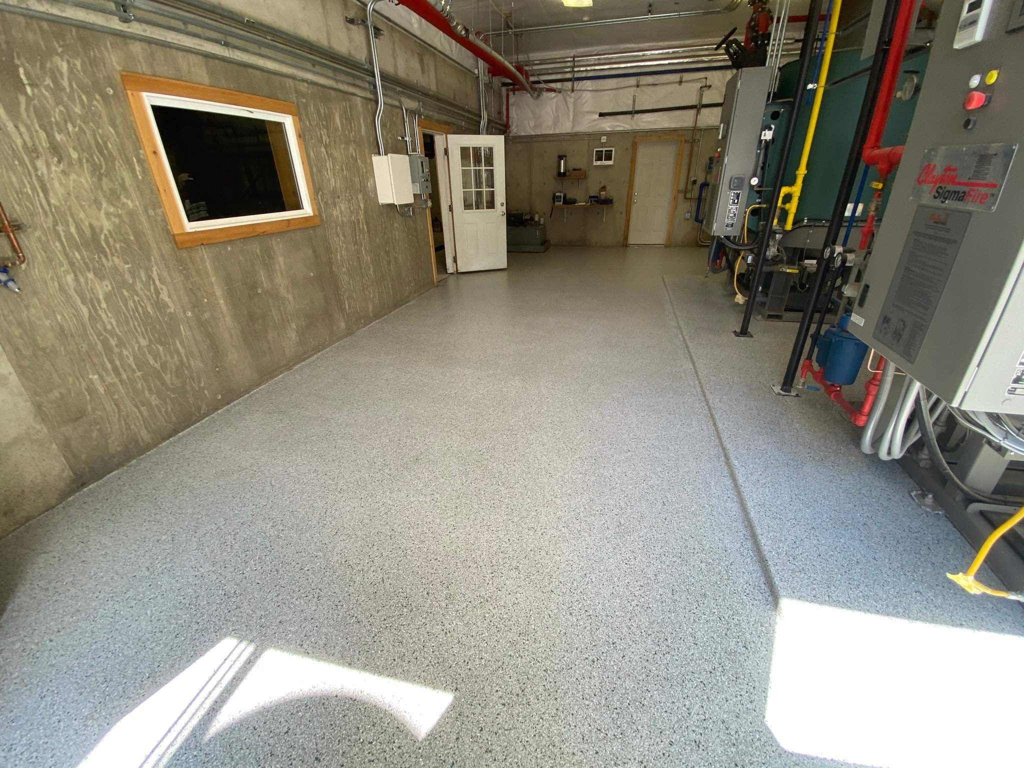 Commercial Floor Transformation using North Pole with Green by Croc Coatings, LLC