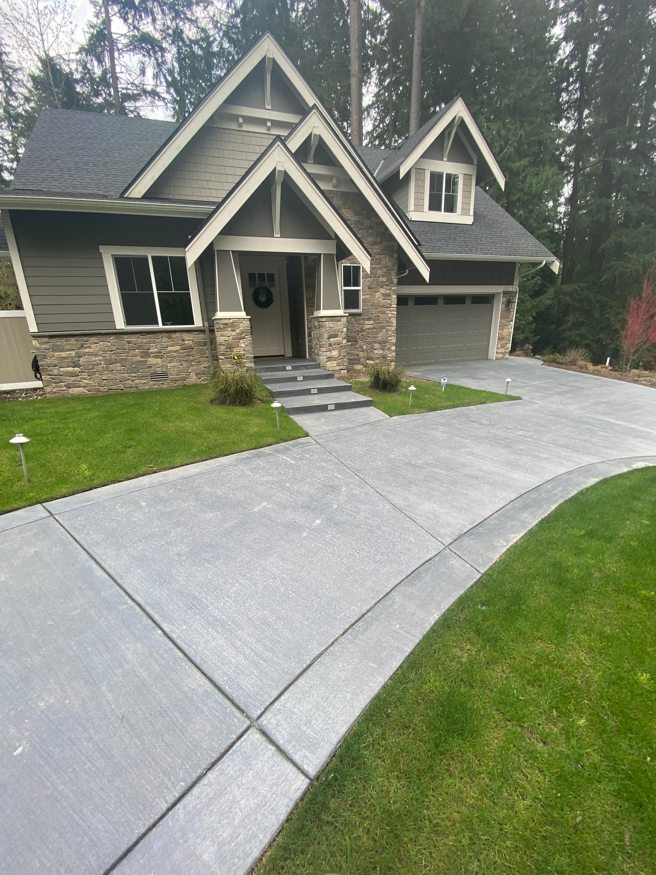 Melanie | Concrete Driveway  by Jireh Asphalt & Concrete Inc 