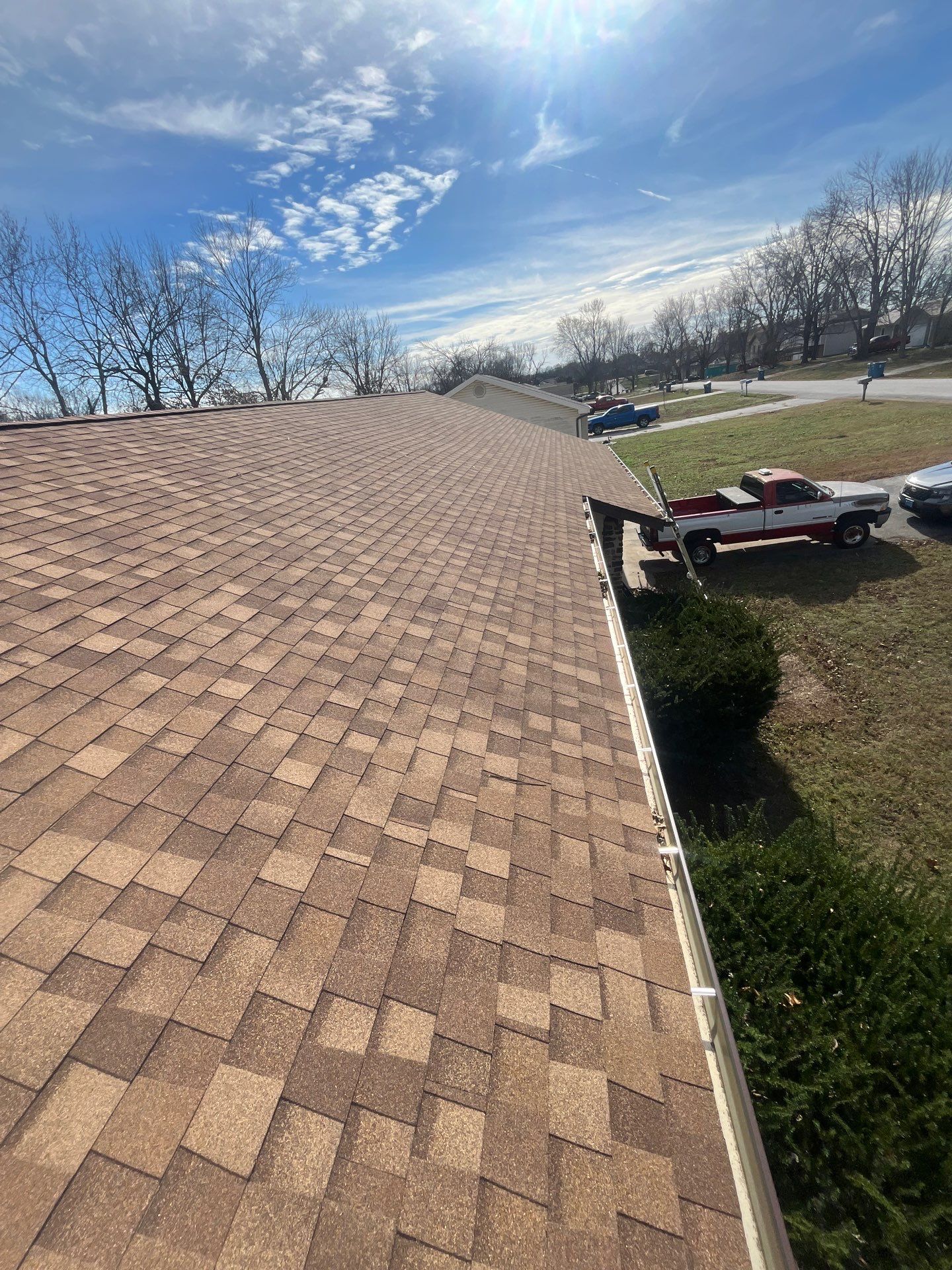 Residential Roofing + Gutters & Downspouts Install  by Titan Commercial & Residential Roofing 