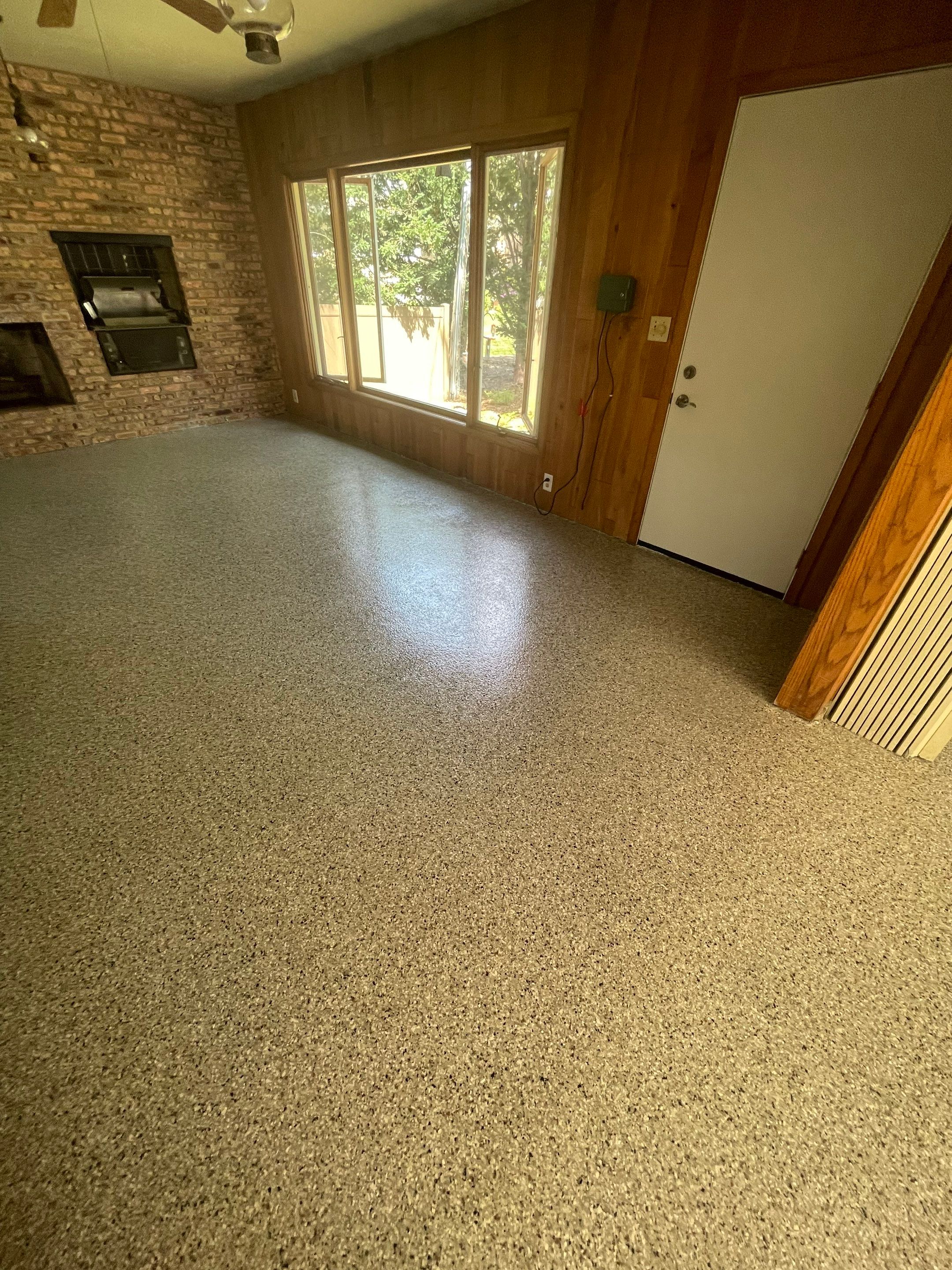 Sioux Falls Garage and Sunroom Concrete Coating with Coyote Flake by Select Painting, Coatings & Garage Cabinets