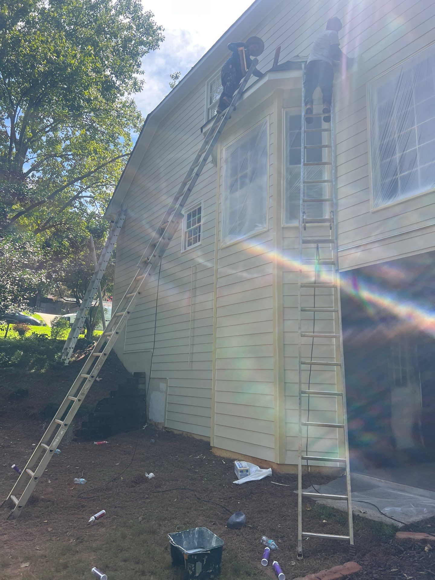 Blue Exterior Paint and Siding Installation using James Hardie Lap Siding by Nelson Exteriors