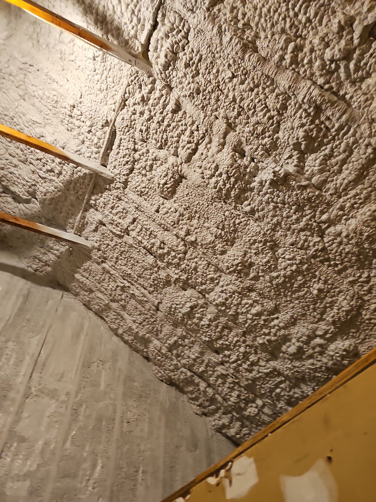 Attic Retrofit using open cell spray foam by NYS Foam & Energy