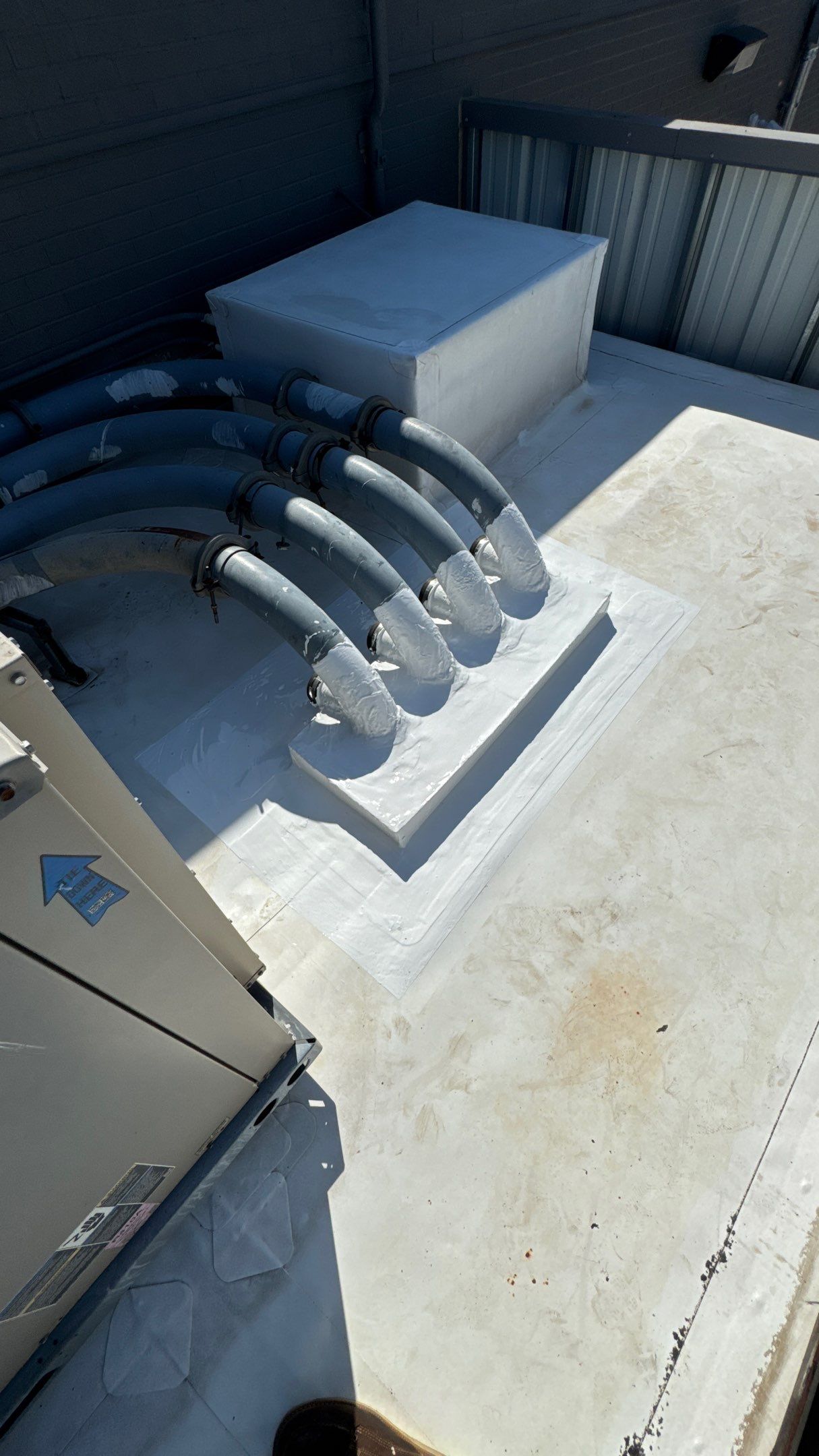 Commercial Roofing Repair using TRP #924 Eterna-Sil Premium Silicone Roof Coating by Harvey Roofing & Construction