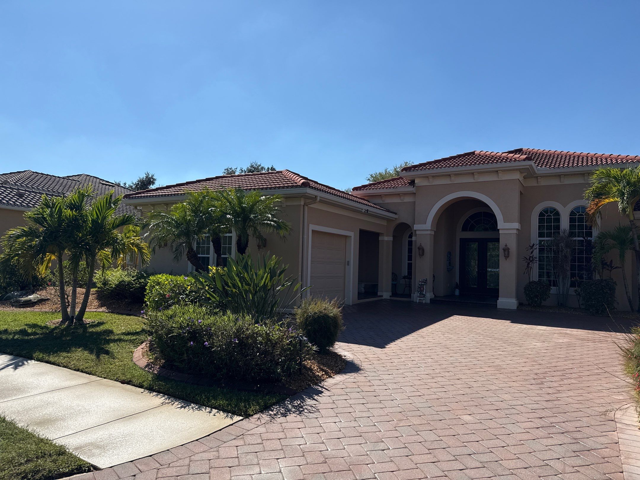Tile Roof Cleaning & Oil Stain Removal | Tara River Place, Bradenton FL by Sunshine AquaWash