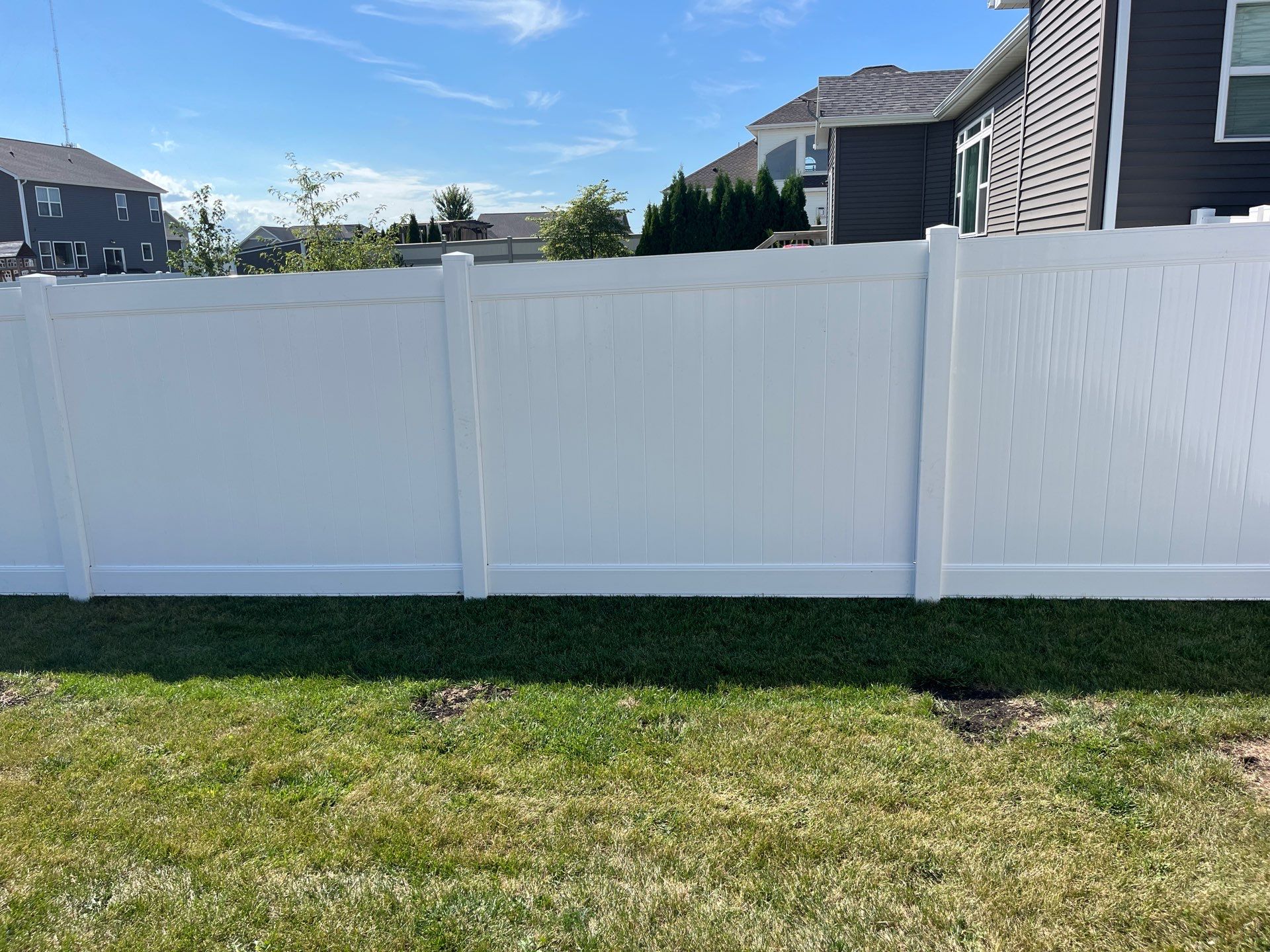 New Vinyl Privacy Fencing and Gates for Waterloo Residential Backyard by Perfect Picket Fence and Stain