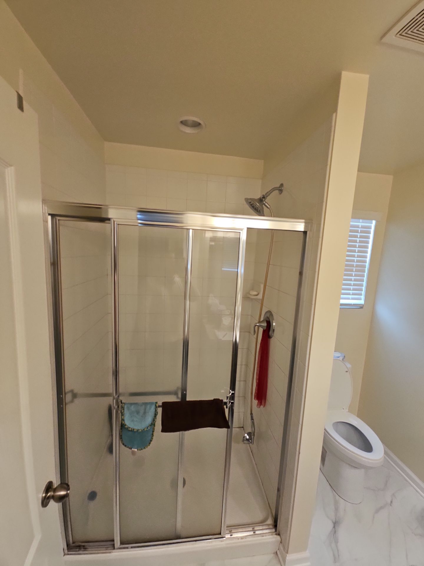 Shower remodel using Maintenance free wall system and shower pan with glass door by Window Depot of Annapolis
