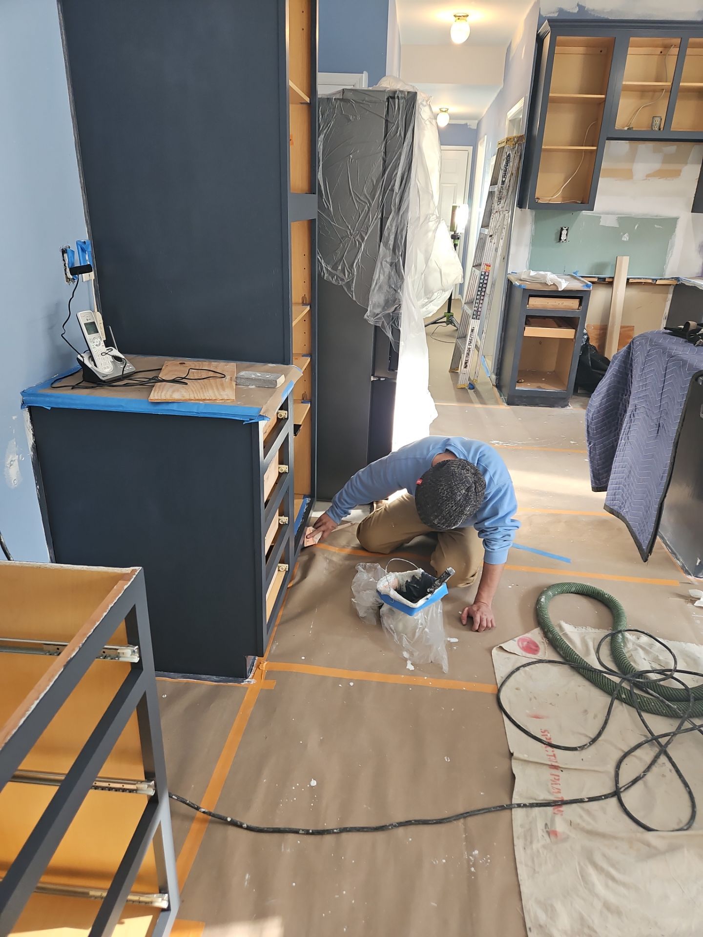 Cabinet Refinishing using Benjamin Moore Command by Spectrum Painting, LLC