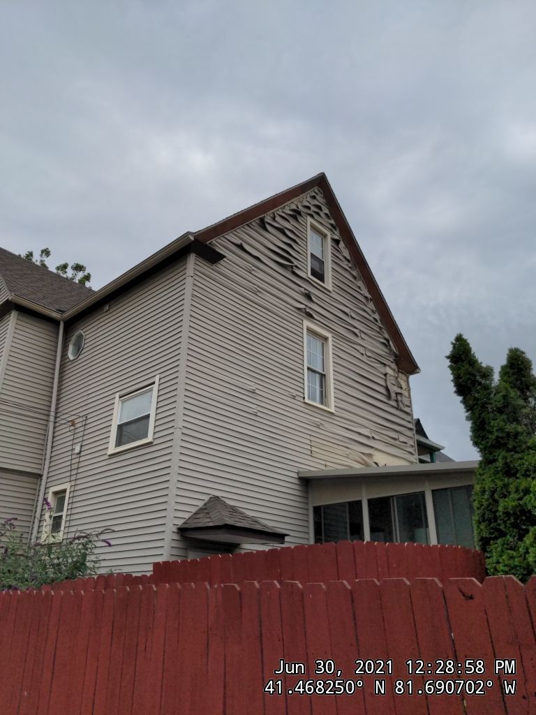 Fire damaged home in Tremont by Absolute Roofing and Construction