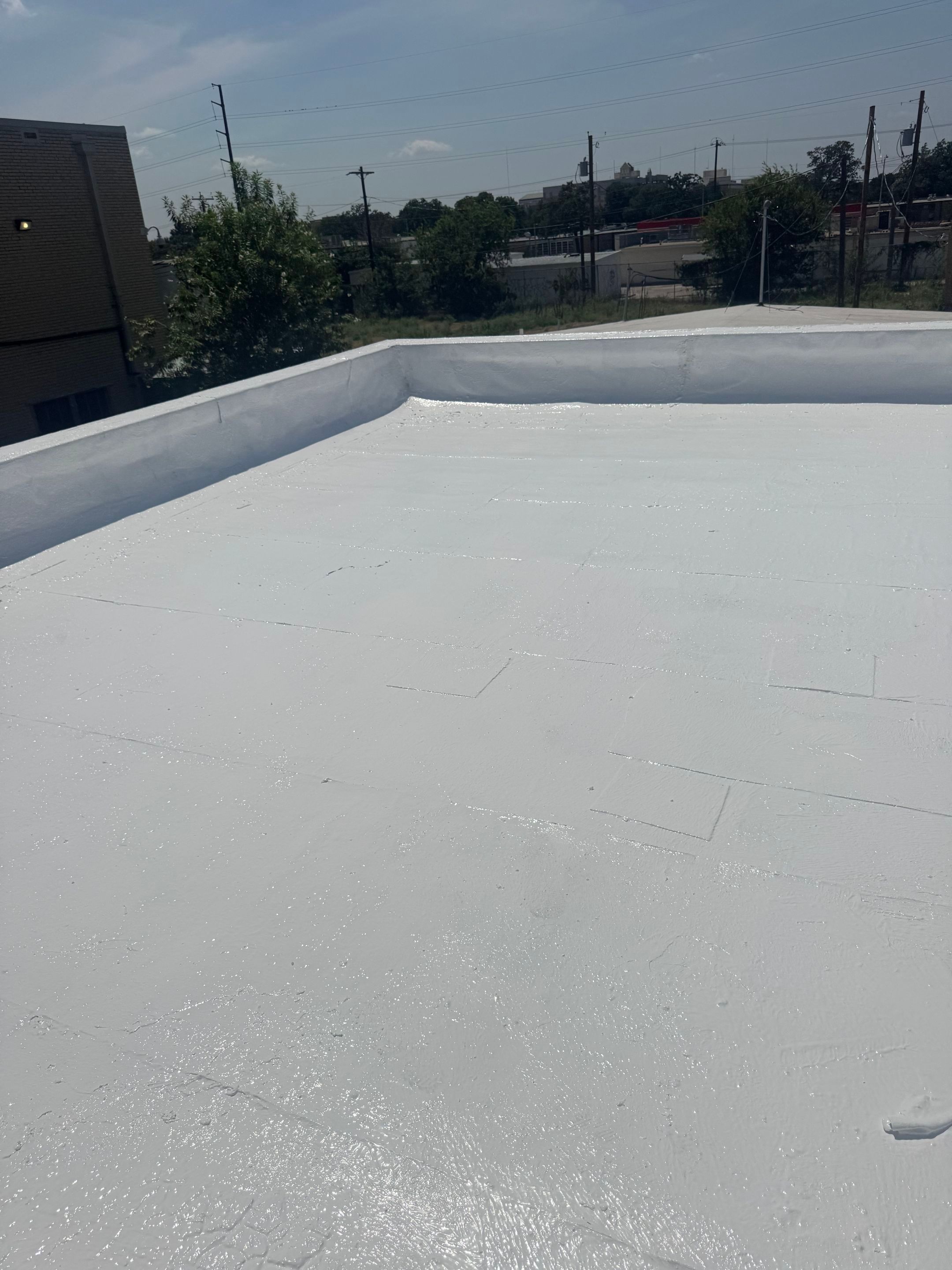 Commercial Flat Roof Coating and Restoration in Austin by RoofsOnly.com