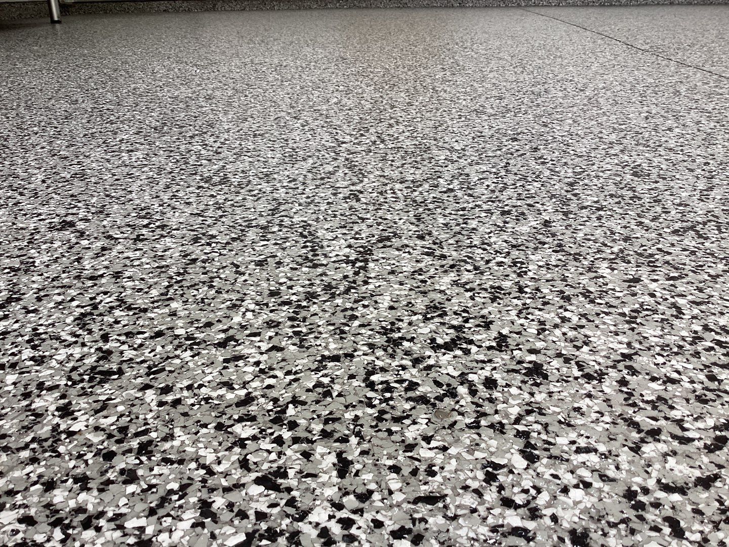 Garage using Domino by Amvet concrete coatings llc