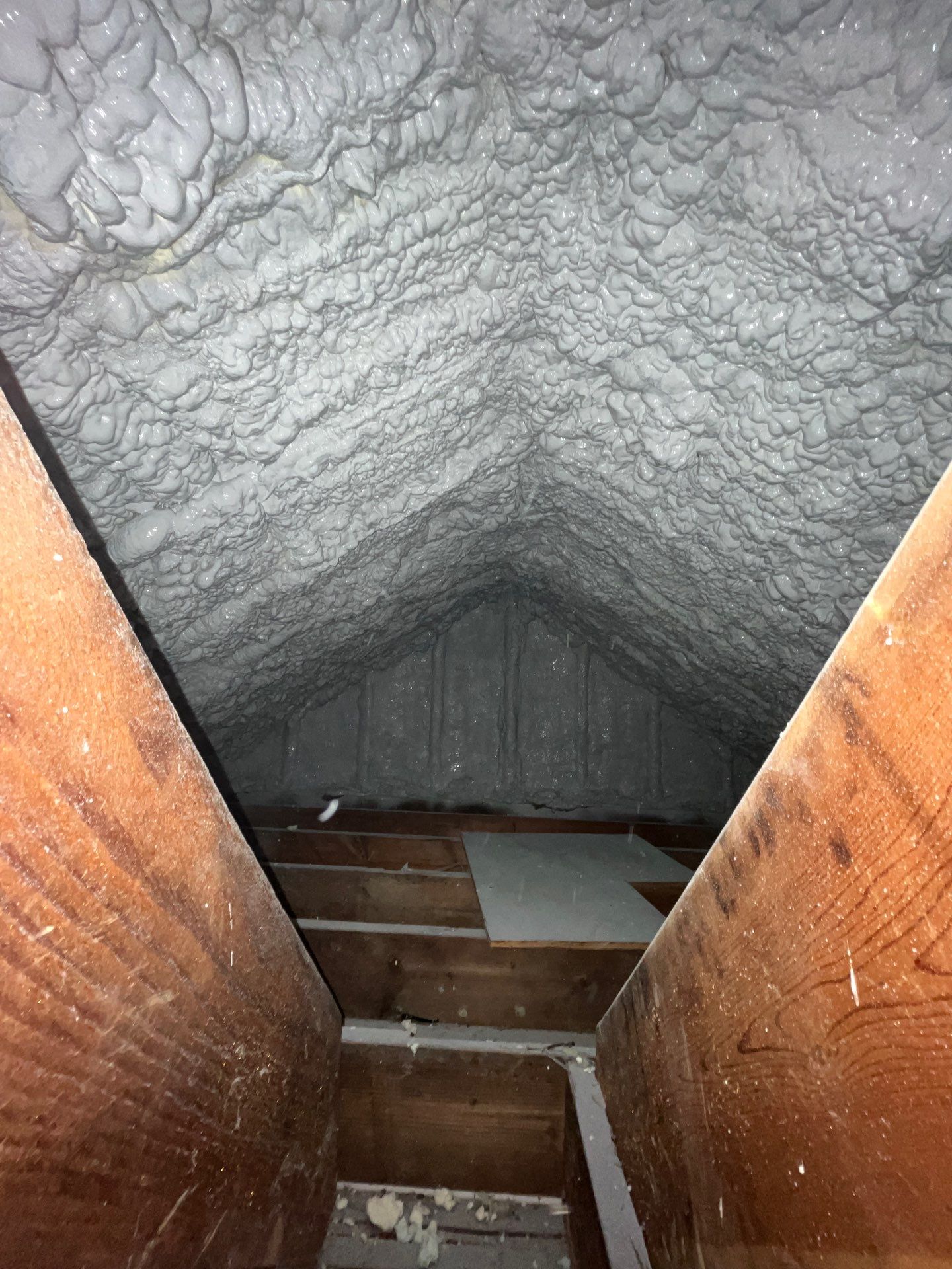 Attic Retrofit using open cell spray foam by NYS Foam & Energy