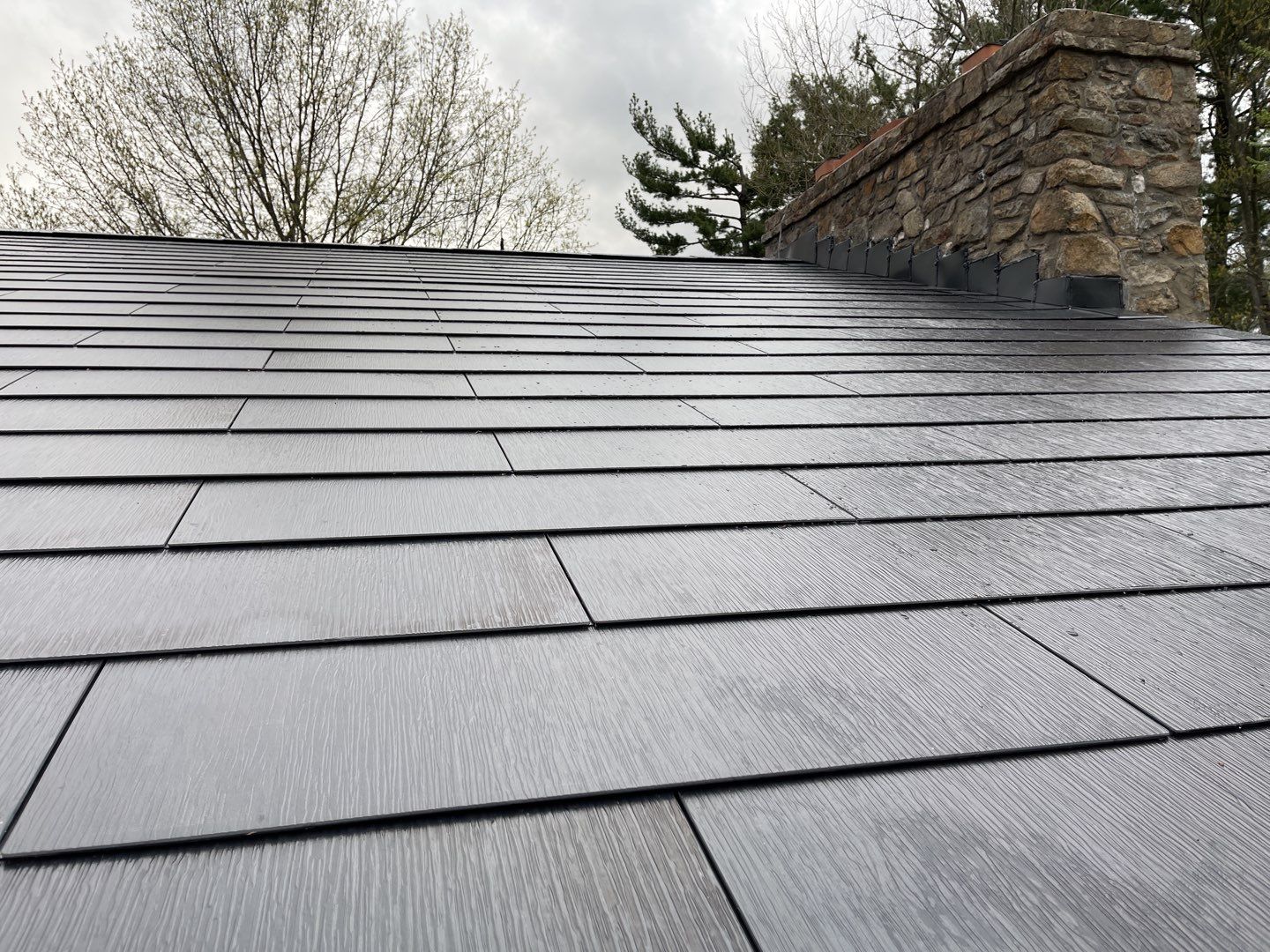 Tesla Solar Roof Replacement by American Home Contractors