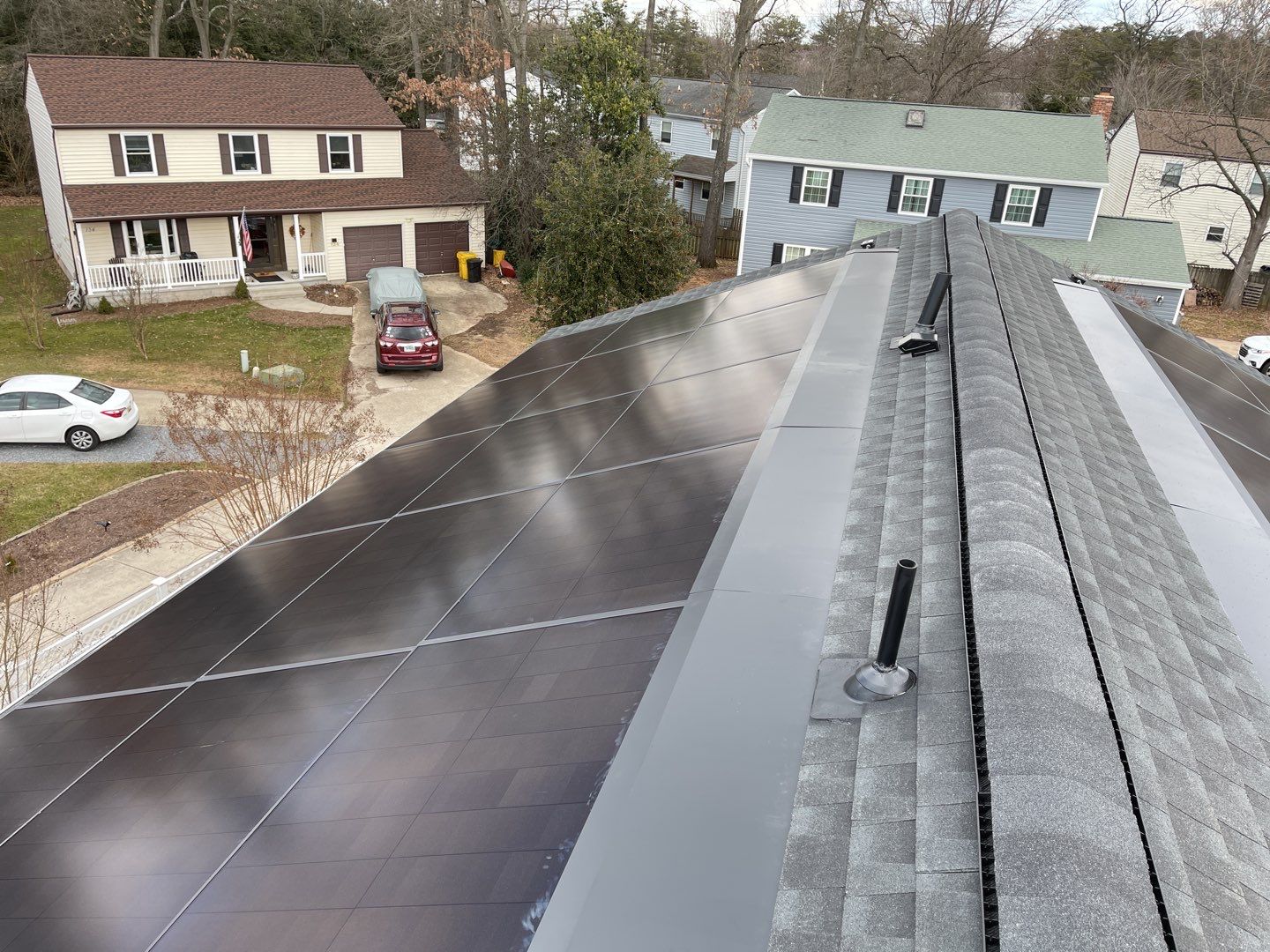 Roof Replacement with GAF Decotech integrated solar panels by American Home Contractors