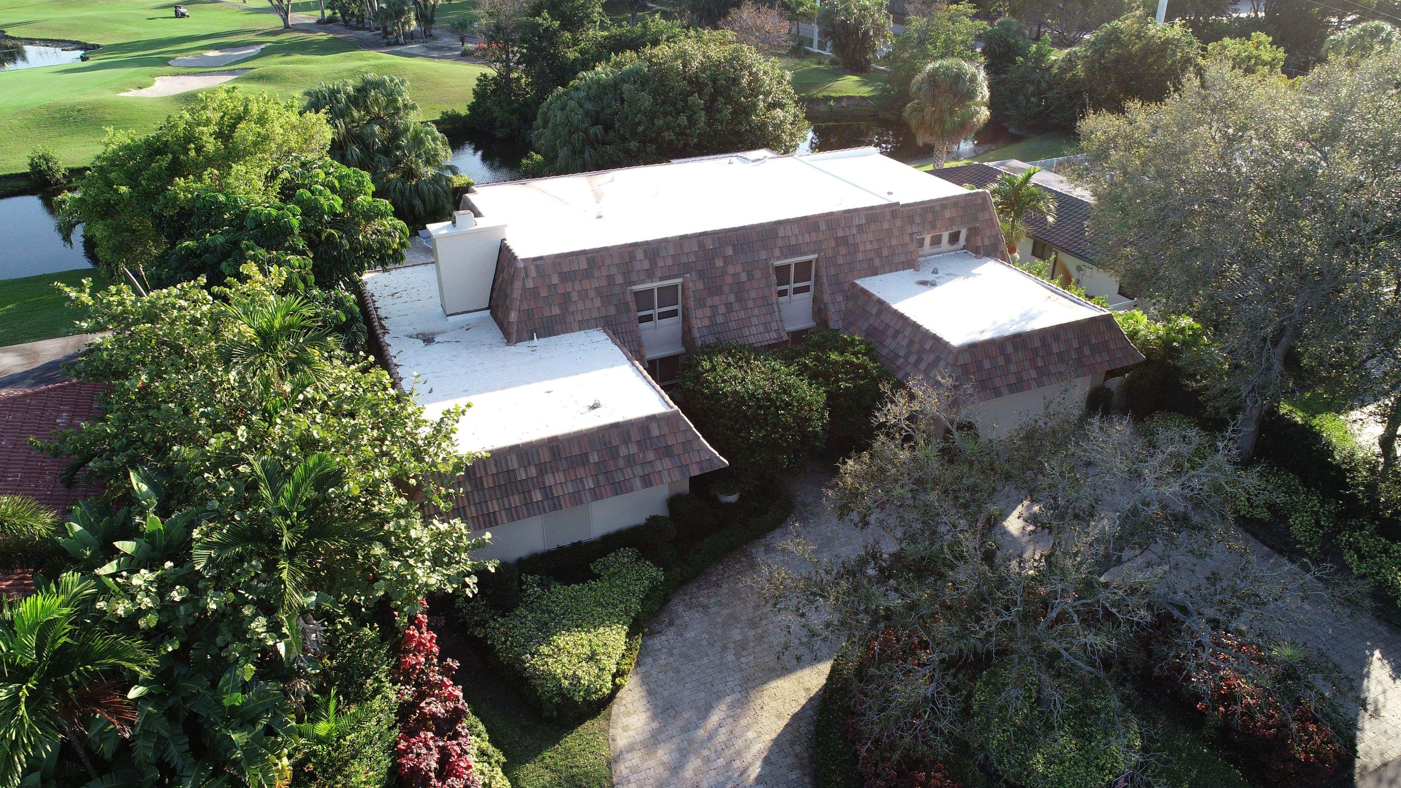 Amazing TPO flat deck re-roof with Eagle mansard in Hollywood Florida.  by First Due Roofing