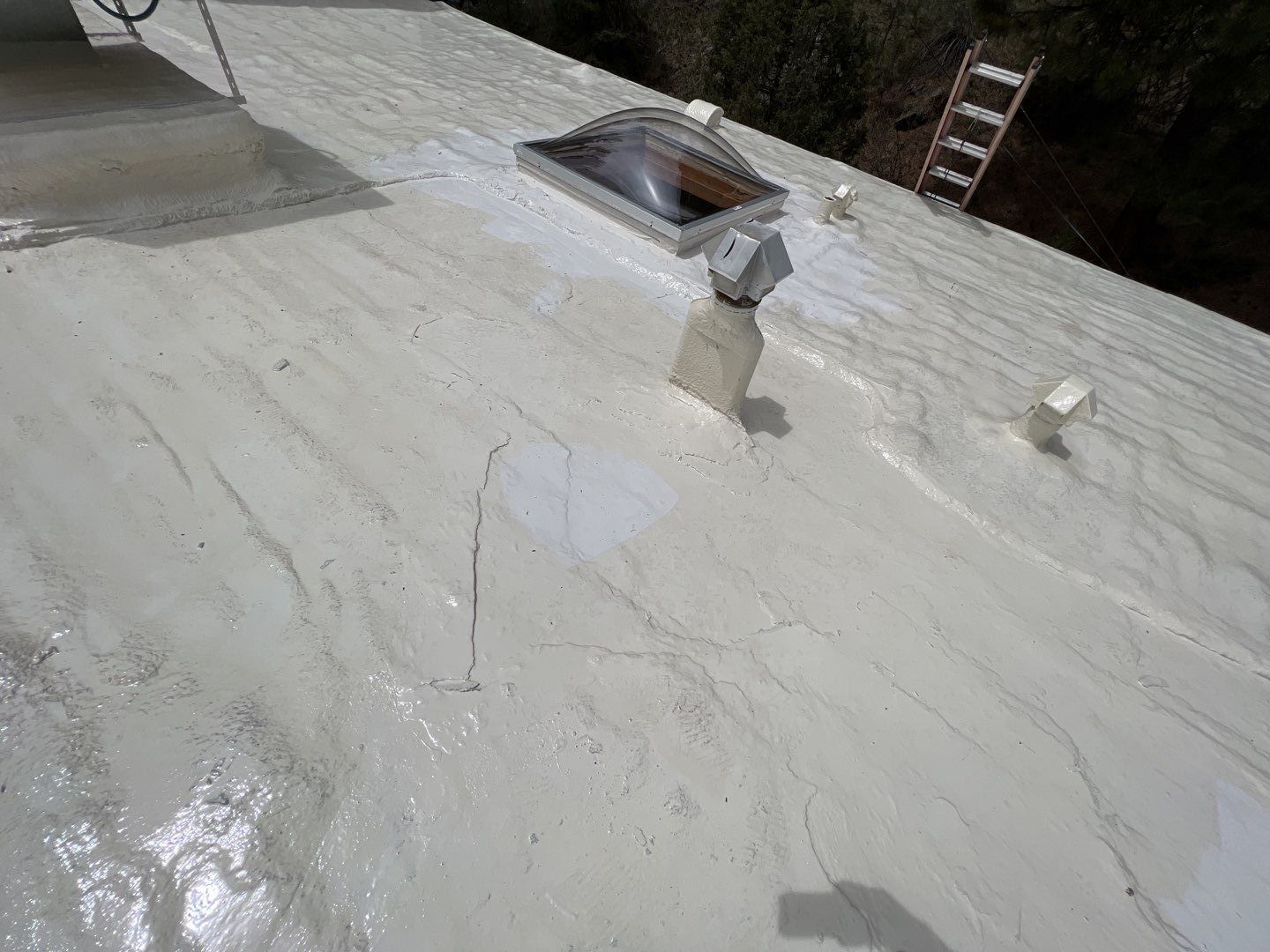 Commercial Roofing Installation using CASTAGRA ECODUR COATING by A to Z Roofing
